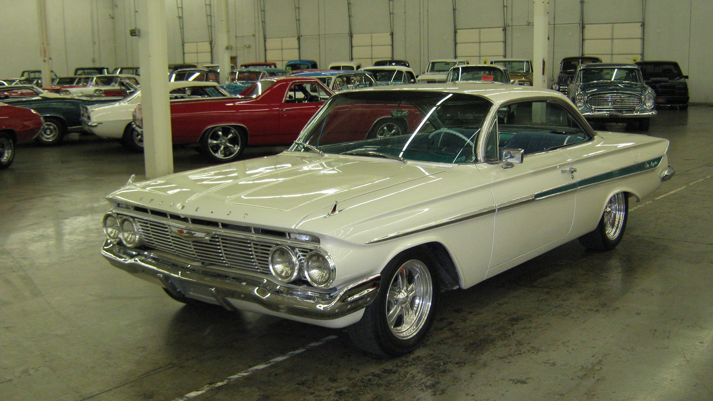 Tom & Sue Rinehart's 1961 Impala.jpg