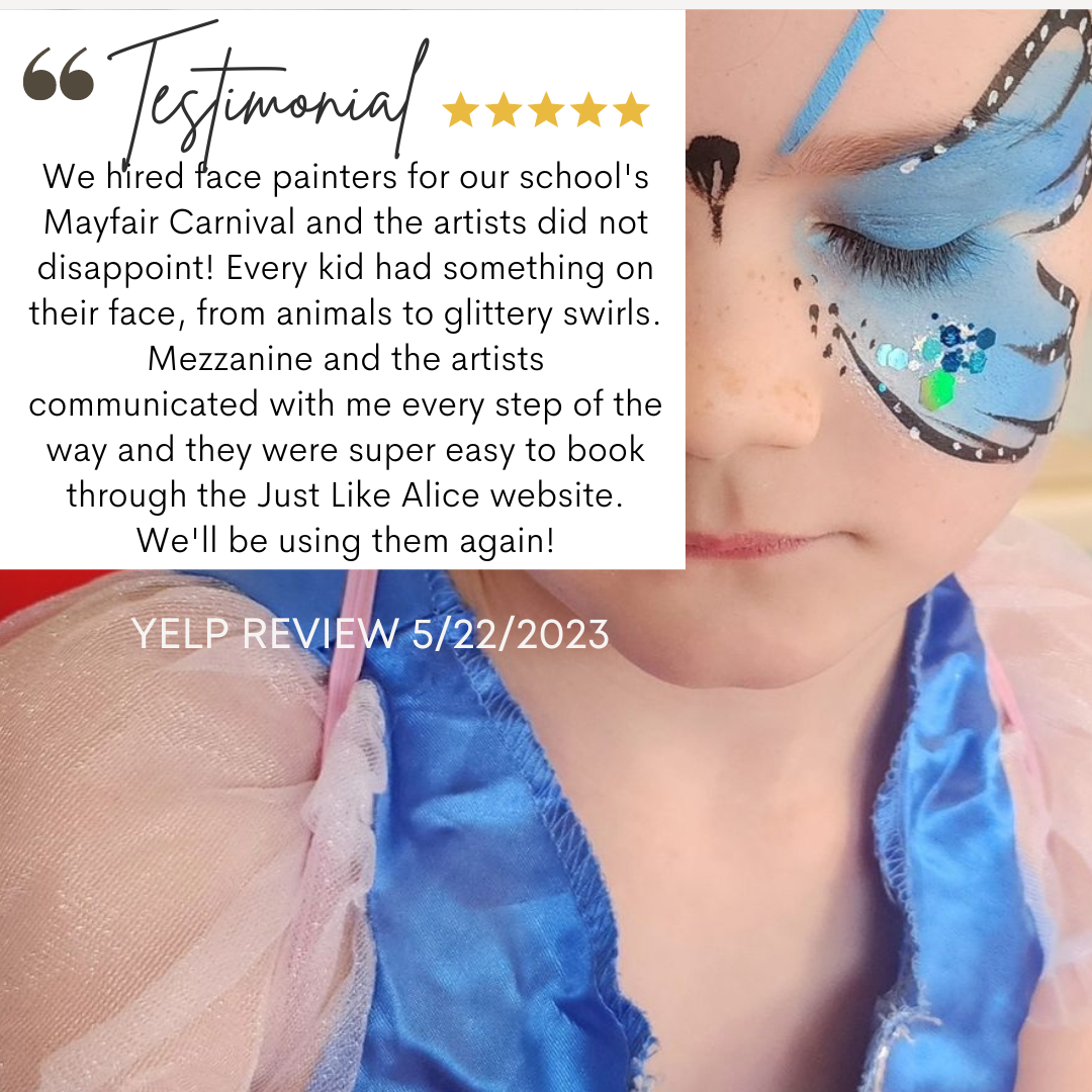 Close-up of a child with face paint of a blue tiger with glitter, wearing a blue costume with pink sheer sleeves, smiling softly and with a positive written review overlay.