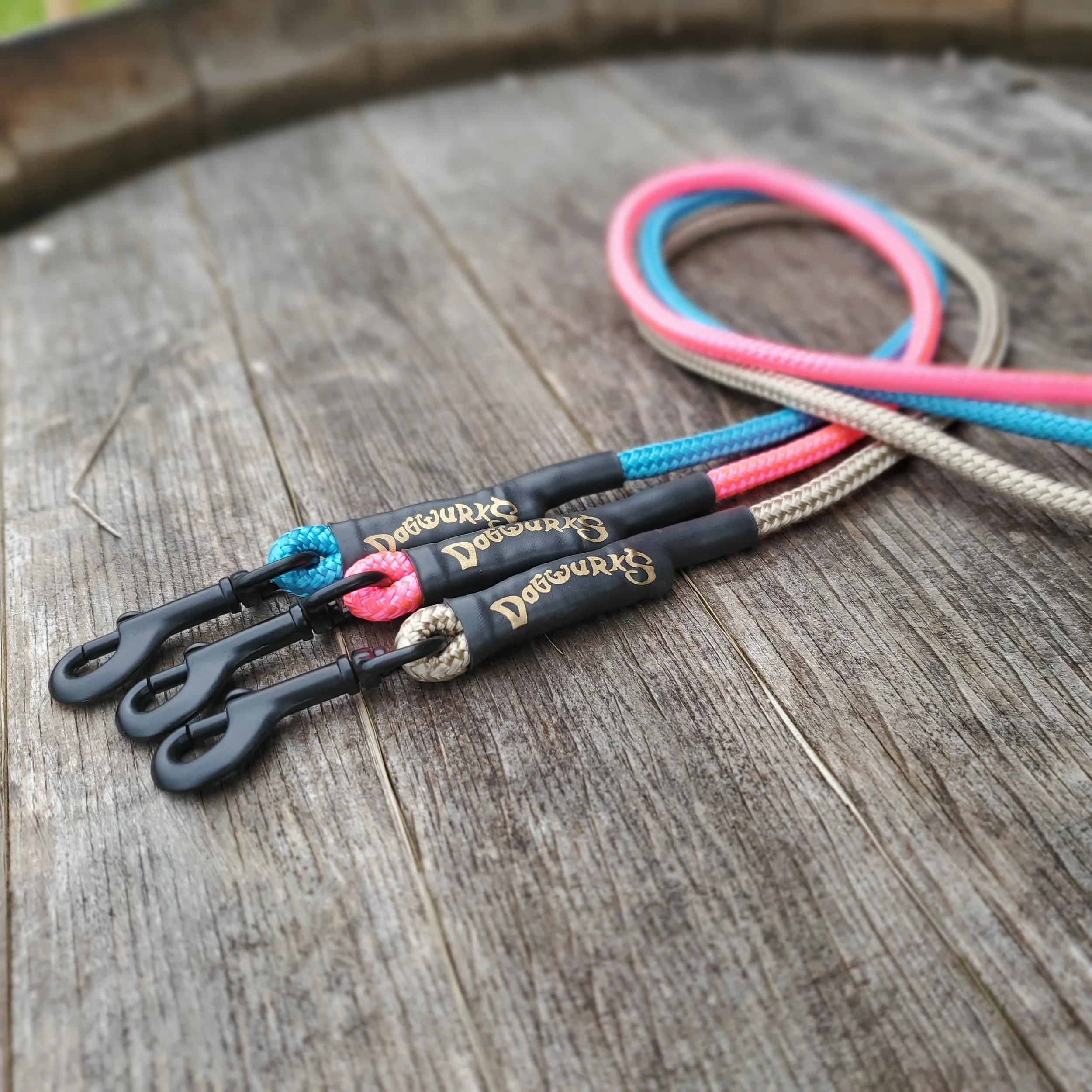 Close-up of colorful shoelaces on a wooden surface.