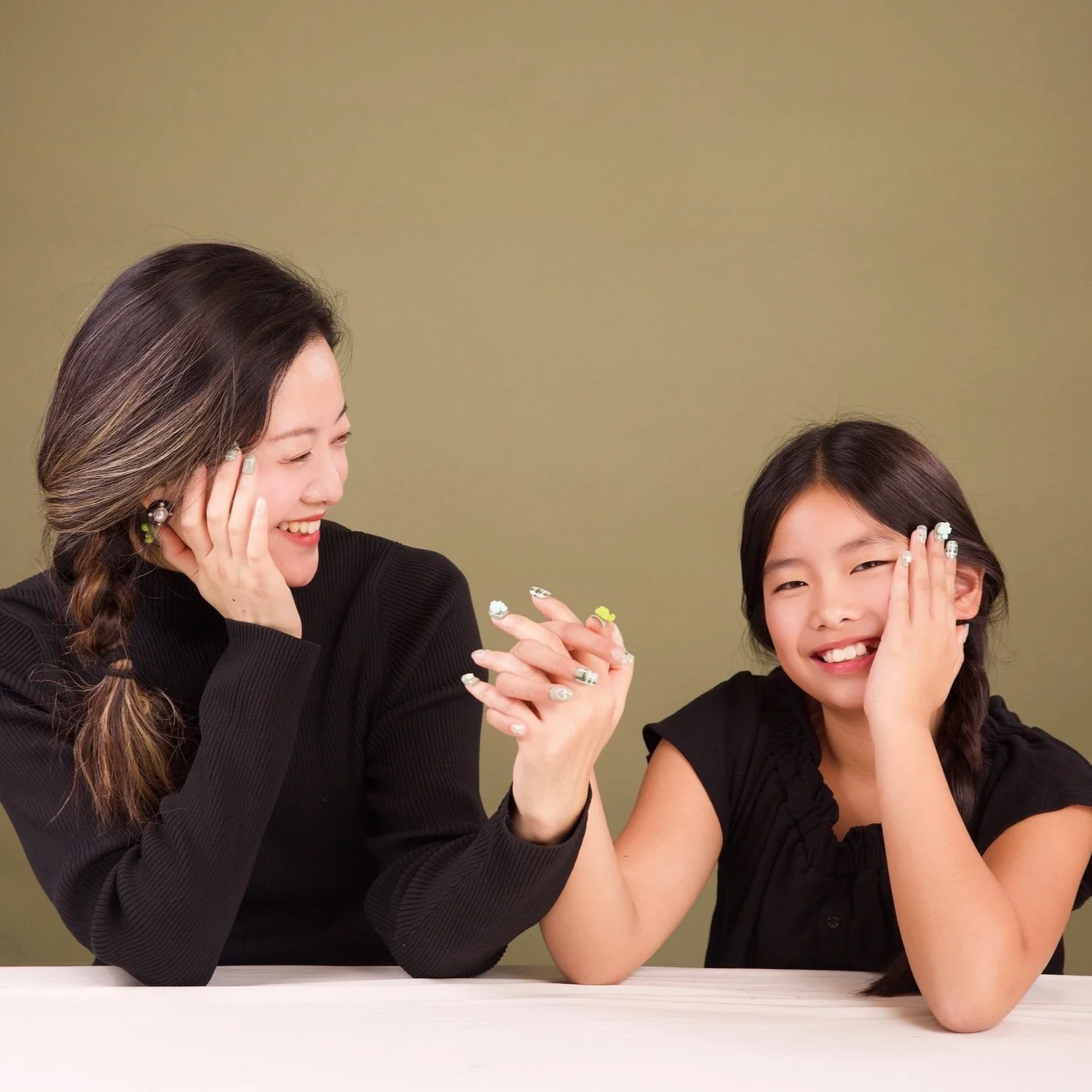 Mother and young daughter joyful portrait, Luminous Space