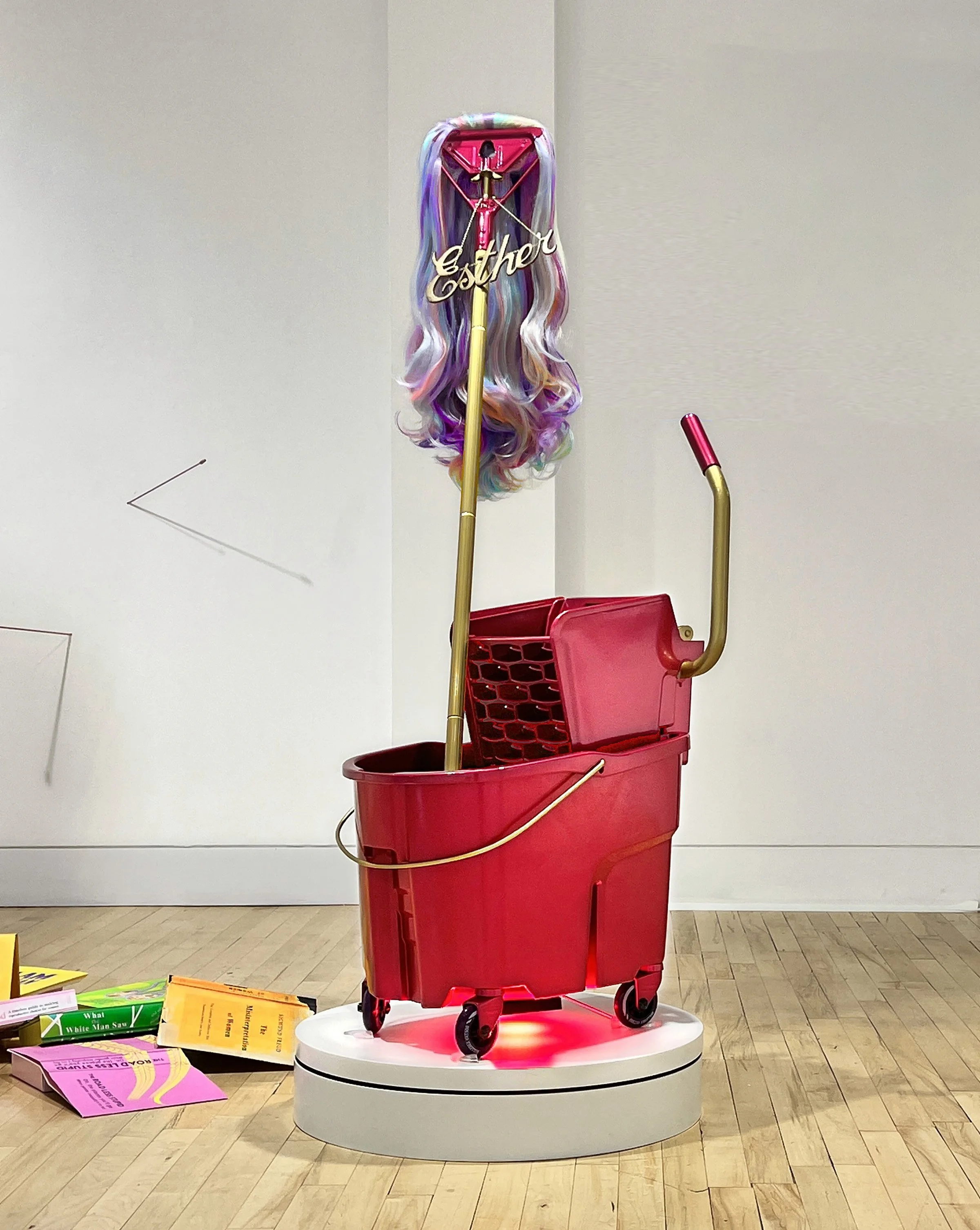 Not Charmed, 2023, 
60 x 44 x 18”
mop bucket, automotive paint finish, inline skate wheels, synthetic hair, LED lighting