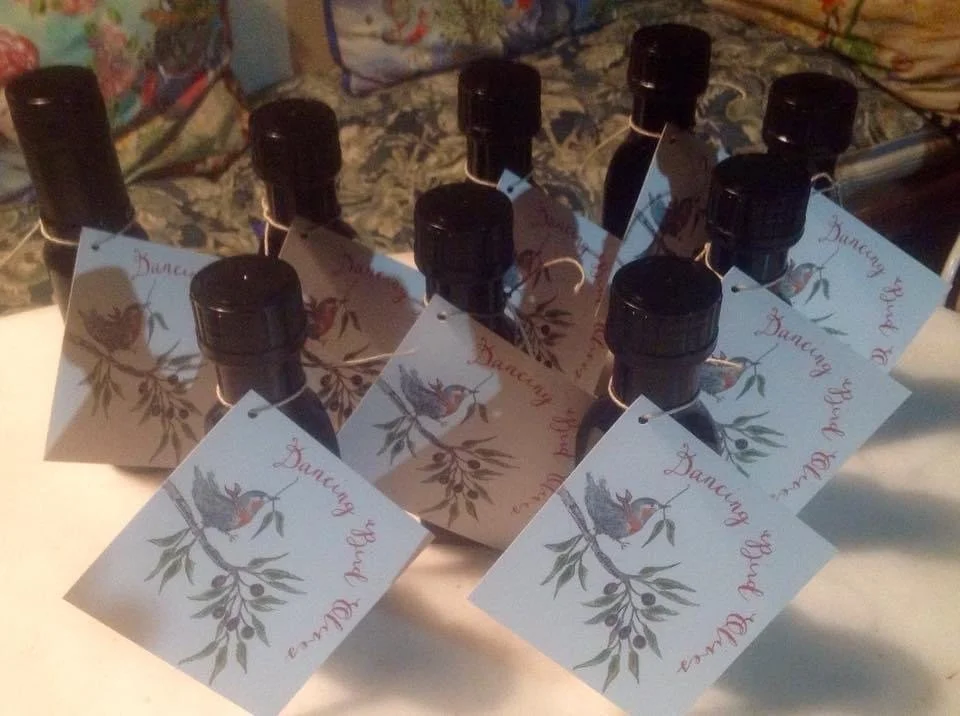 Olive oil with lables display.JPG