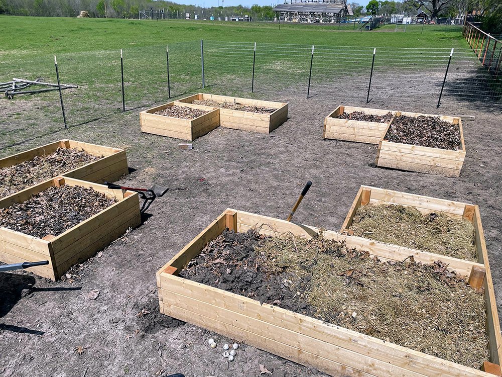 Filling Raised Beds with Compost.jpg
