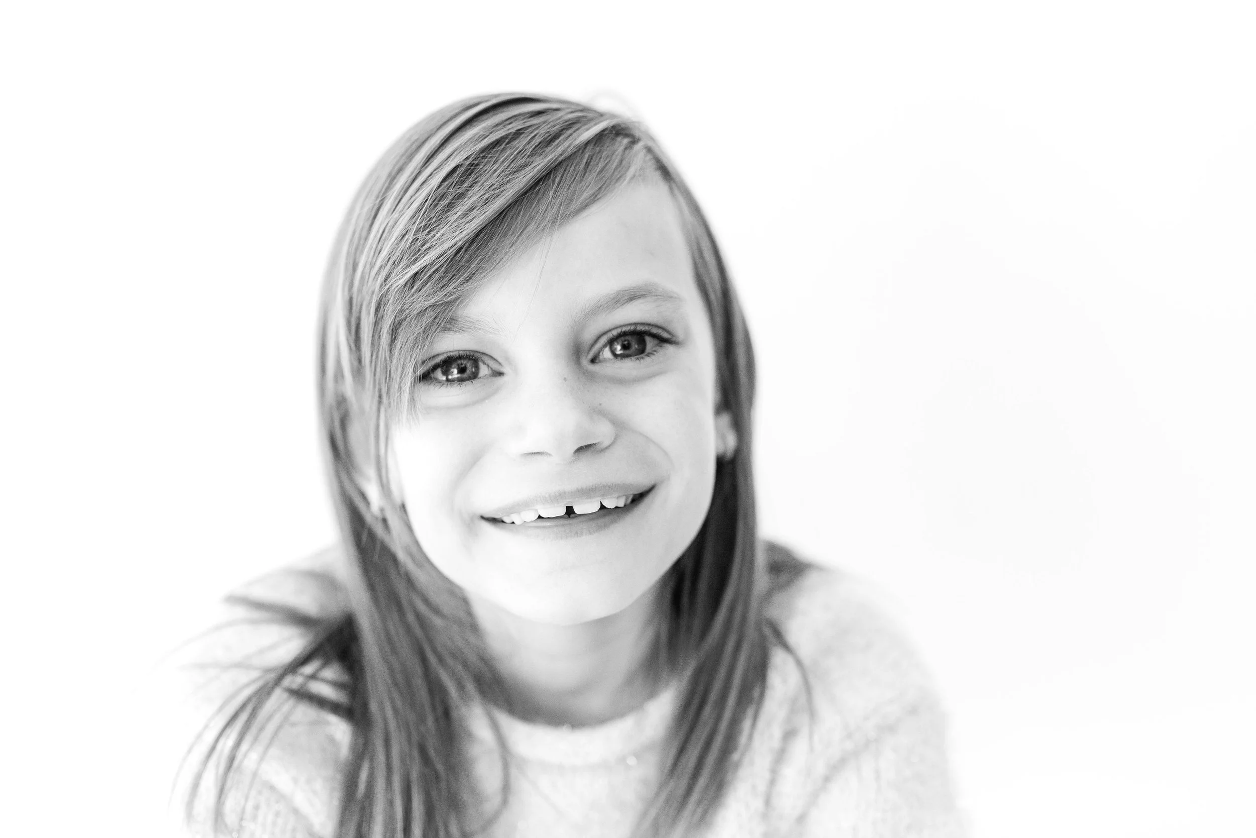 Personality portraits in Tulsa, Oklahoma capturing children and families through heirloom photography.