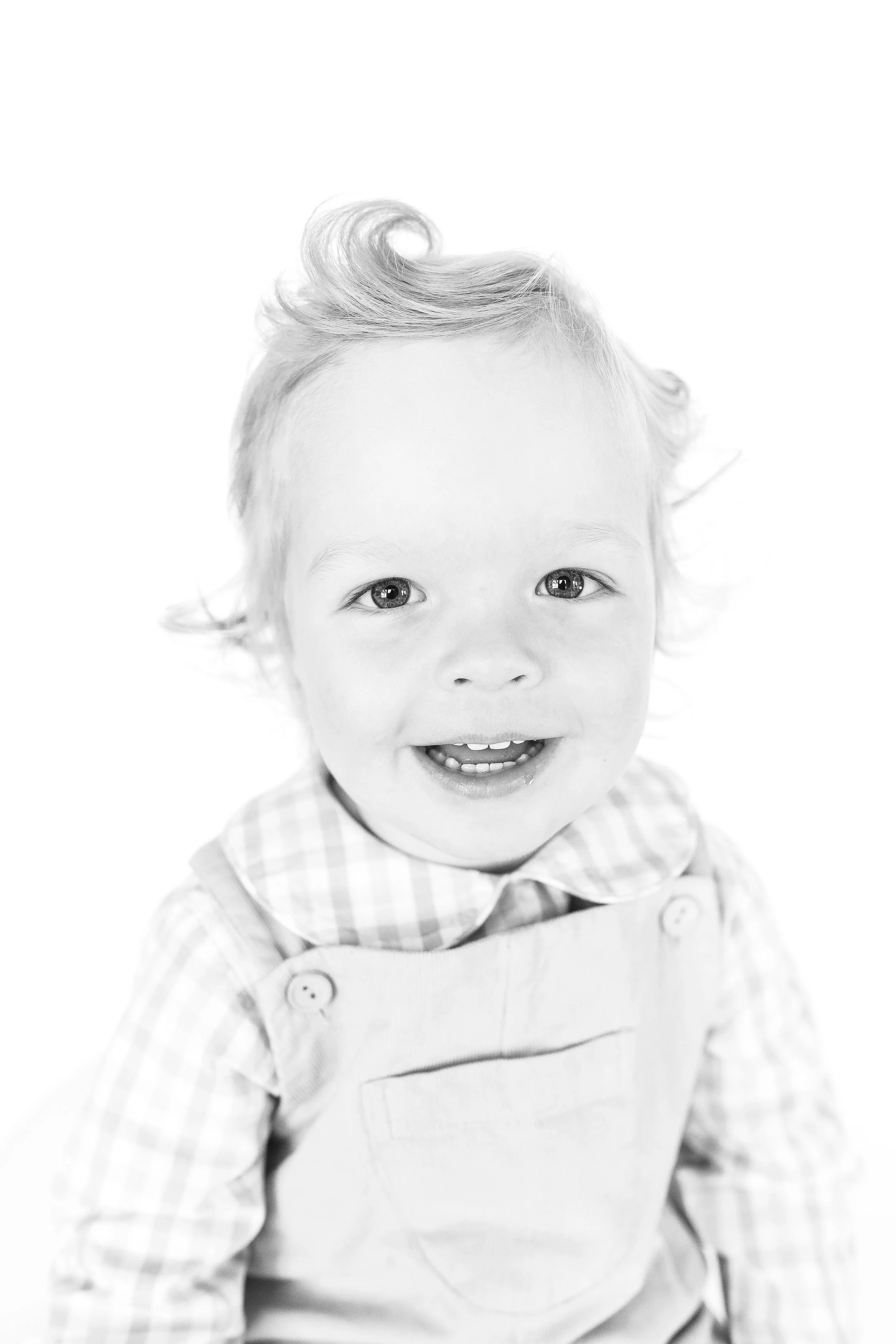 Baby portraits in black and white heirloom style by Kacey Gilpin that capture genuine personality.