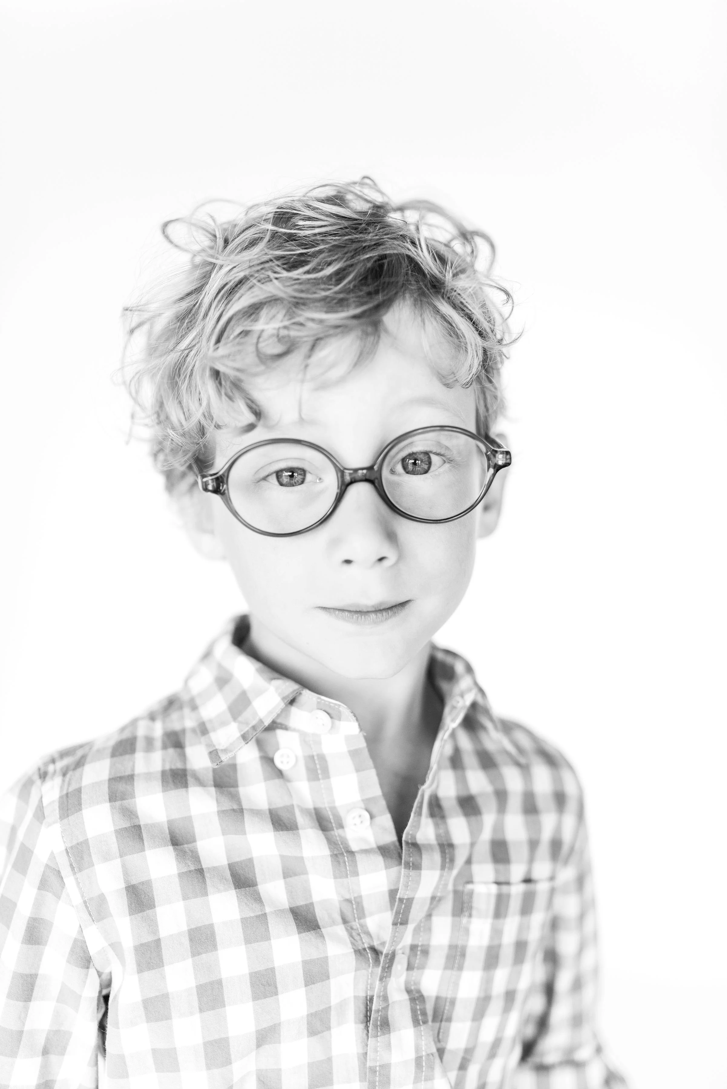 Timeless and classic black and white portraiture of children in Tulsa, OK that document personality and become family heirlooms for generations to come.