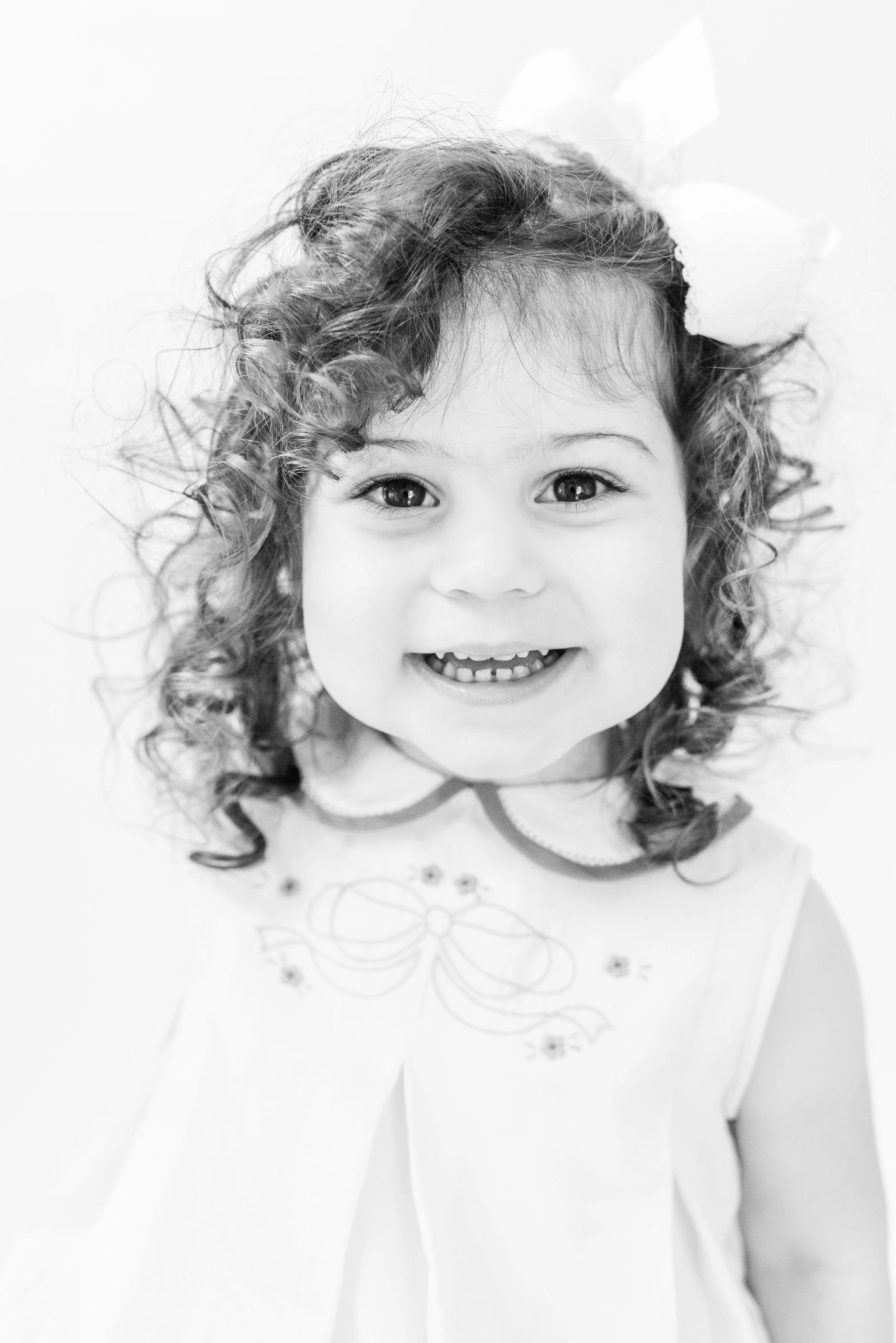Personality portraits of kids in Tulsa, OK in the black and white heirloom style that become fine art printed memories for years to come.