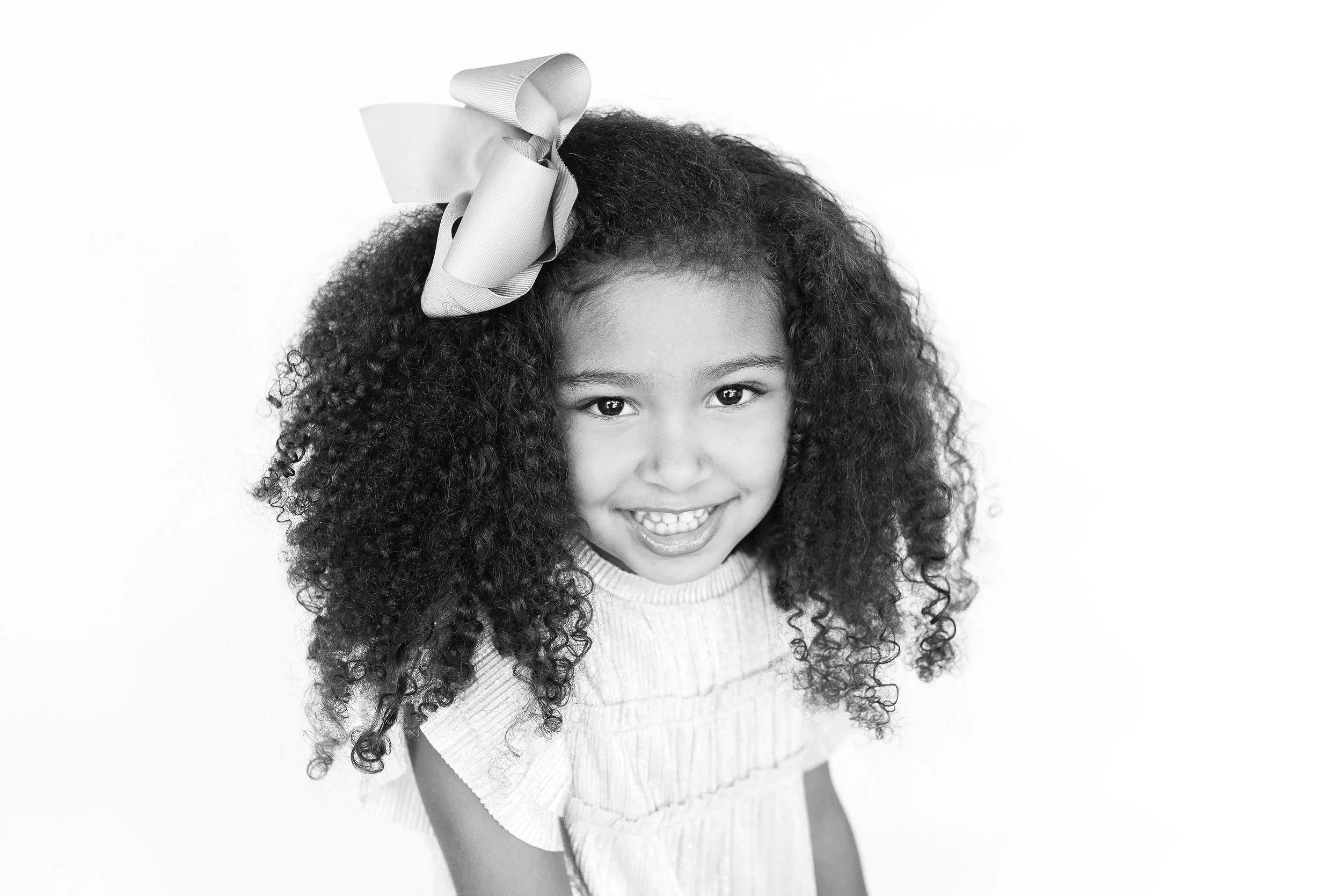 Tulsa children and family photographer fine art heirloom portrait in black and white style. Personality portraits for kids in Oklahoma.