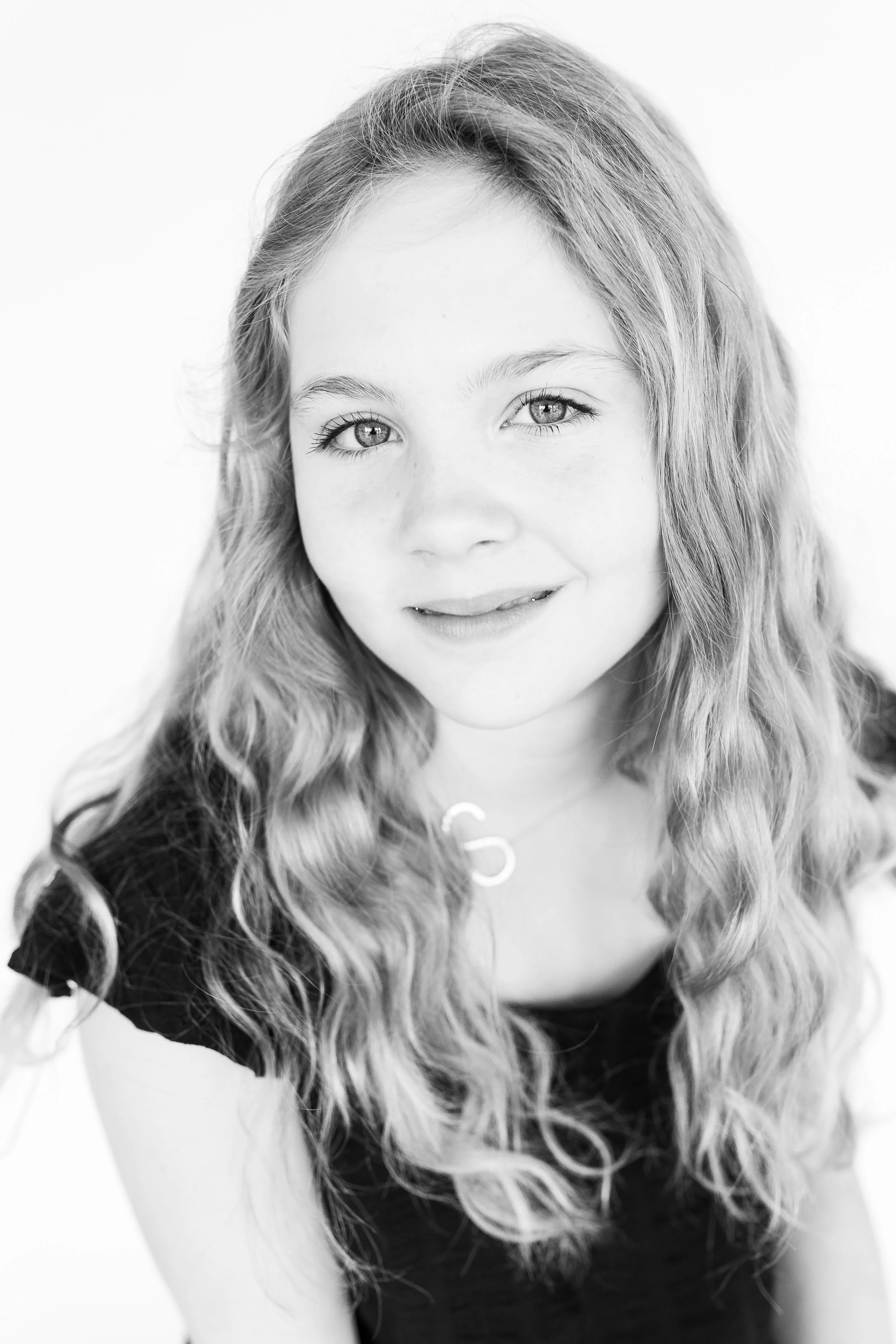 Teenage personality portraits in black and white studio based in Tulsa, Ok. 