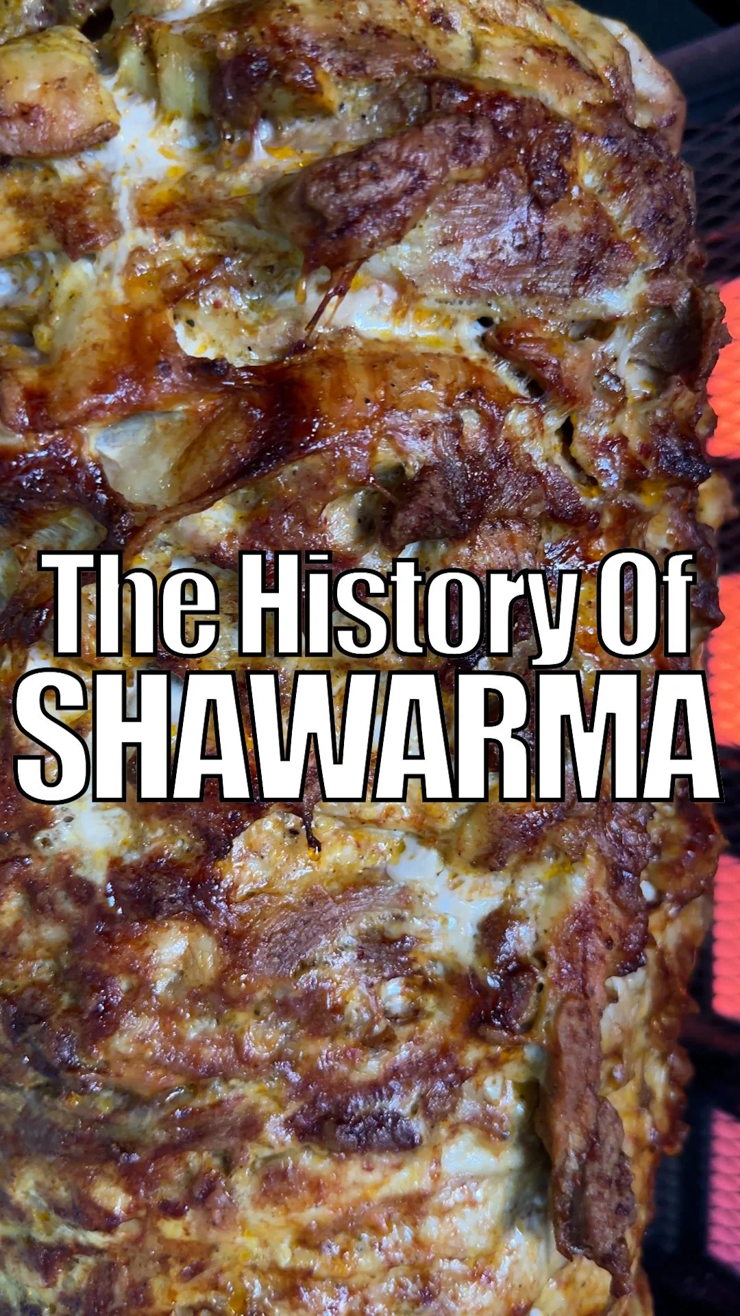 An image of chicken shawarma on a spit. By clicking the image, you'll be directed to a website that explores the history of chicken shawarma and how it arrived in New York City. You'll also discover the best place to eat it.