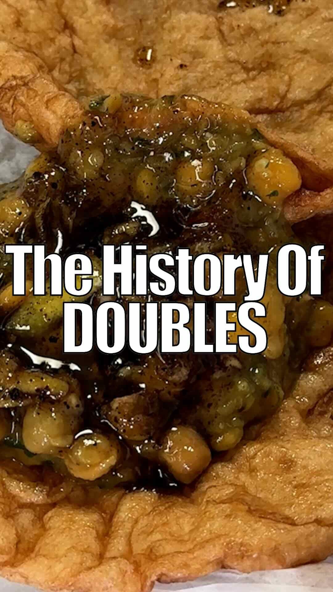 A close up image of a Trinidadian double being made at A&A Doubles in Bed Stuy Brooklyn. This features fried bread, chickpeas, and various sauces.