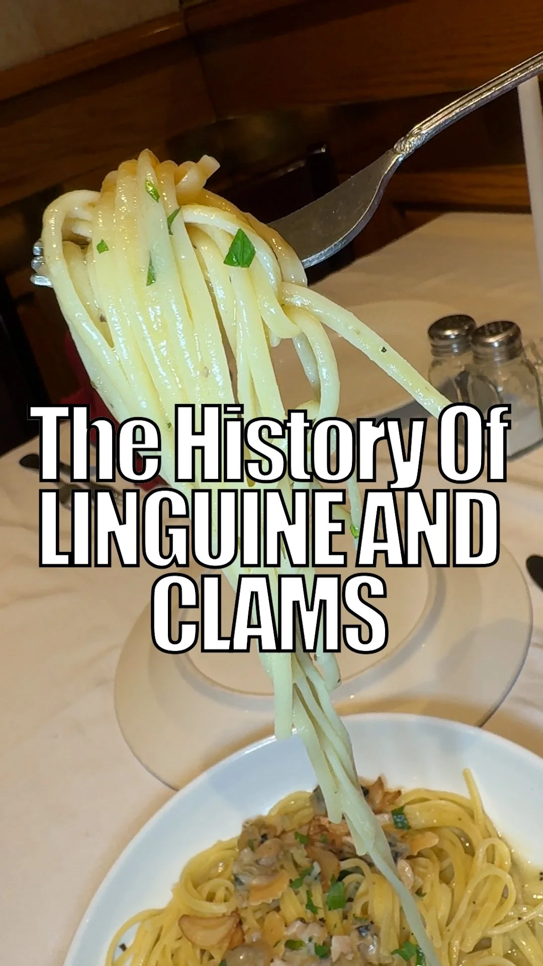 An image of a fork pulling Linguine and Clams at an Italian American restaurant