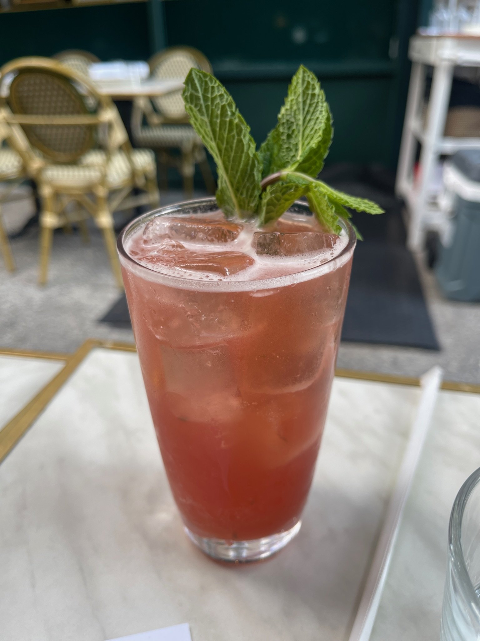 Photo of a vibrant, refreshing cocktail in NYC