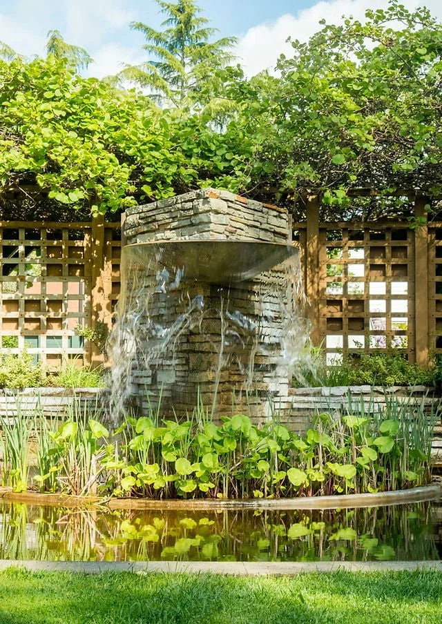 Fountain surrounded by greenery at Luther Burbank Home and Gardens.