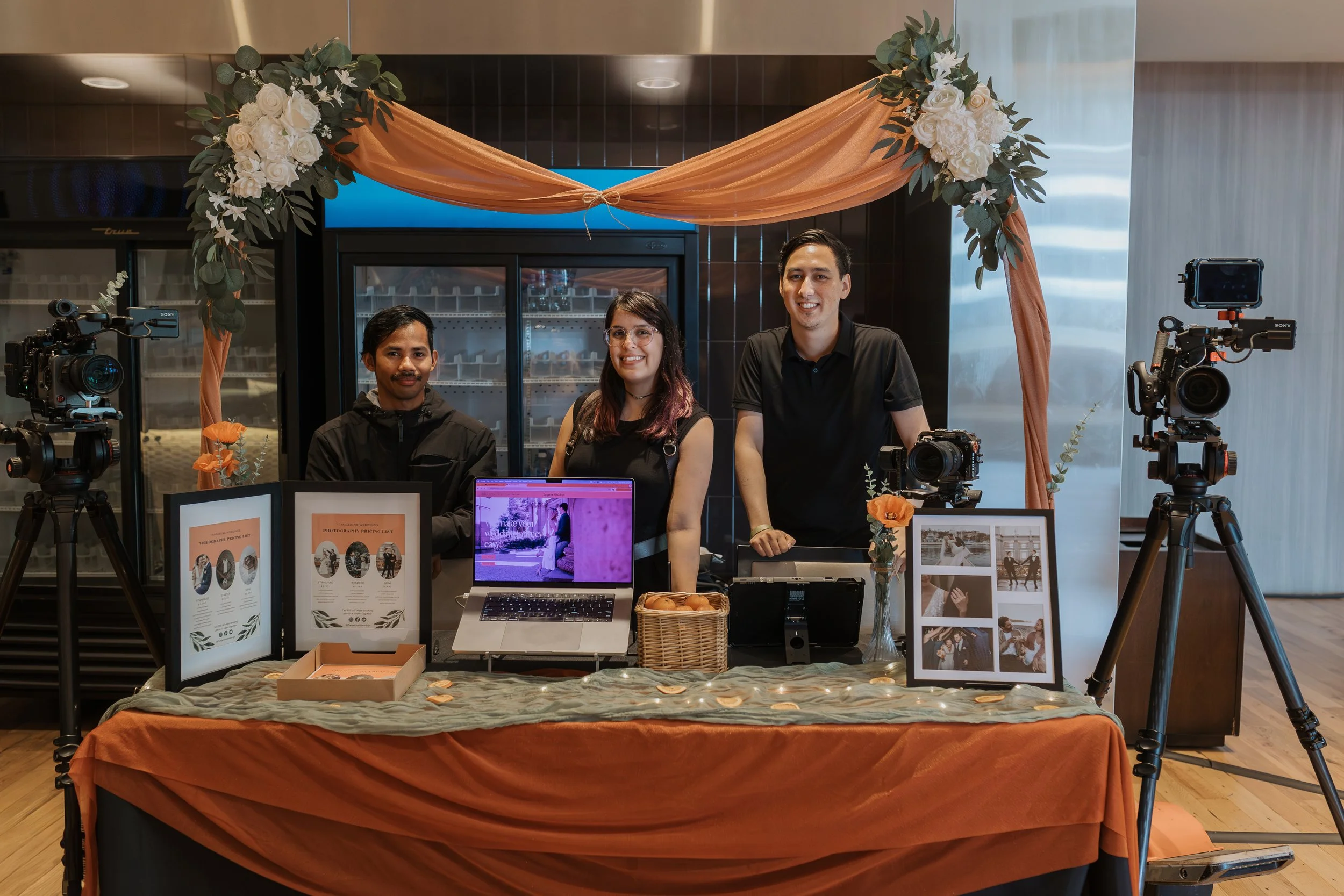 Tangerine Weddings at a wedding fair booth at Levi Stadium in Santa Clara.