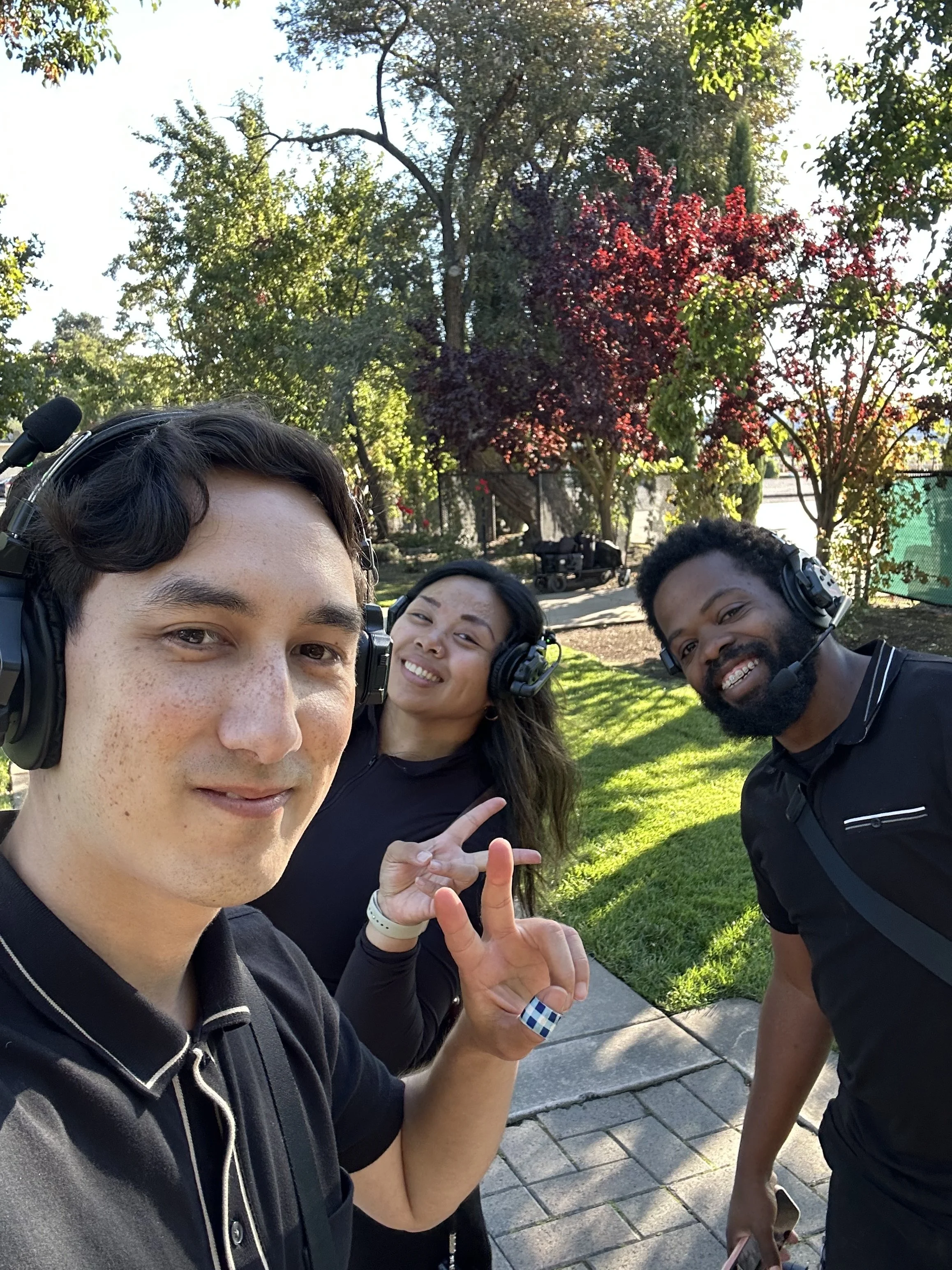 Tangerine Weddings team poses for a selfie before a wedding ceremony.