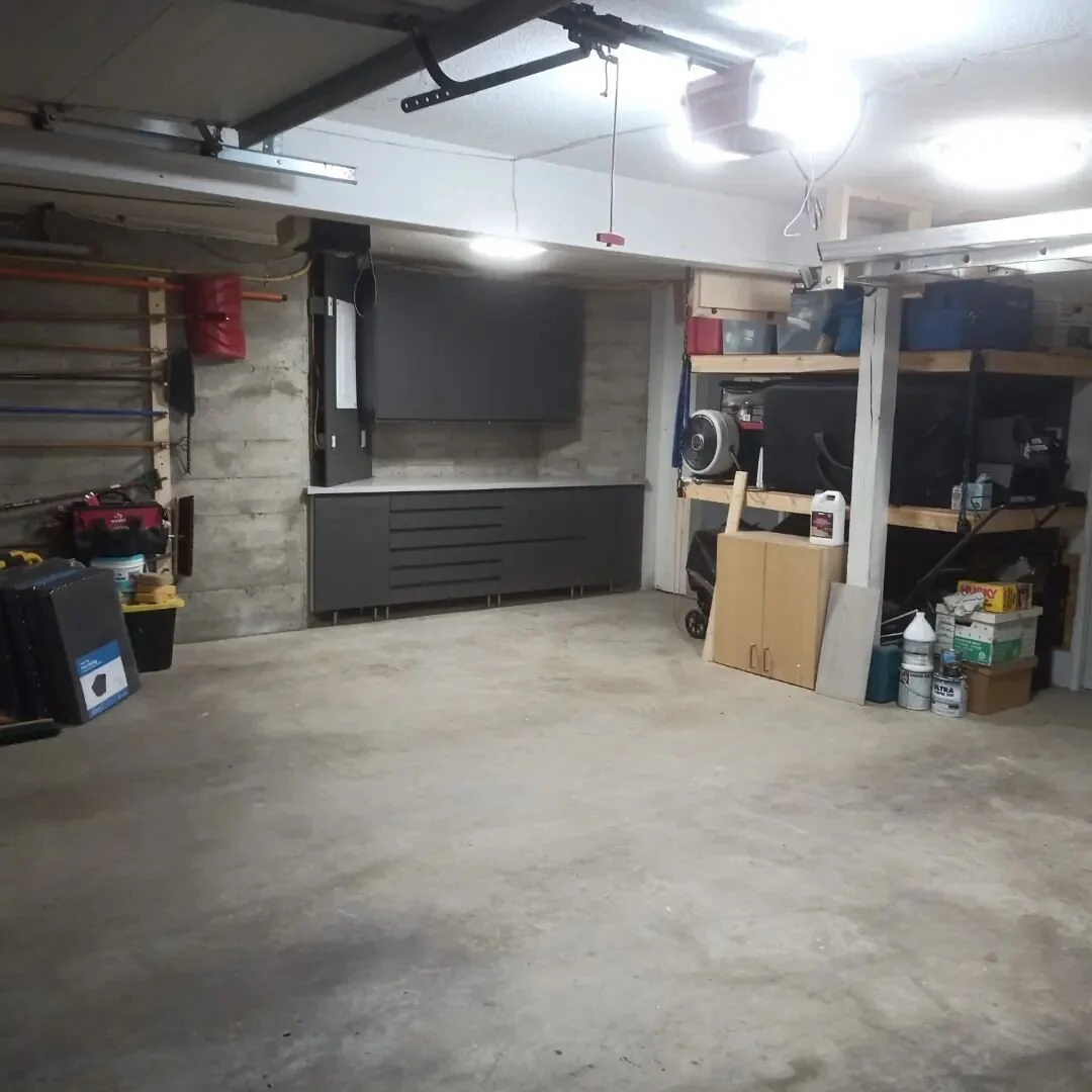 We started with a blank slate and a loving wife's desire for a man cave for her mountain bike loving husband. We began by building a bike storage space with added lighting, walnut stained slat walls and ceilings, and featuring a chain suspended shelv