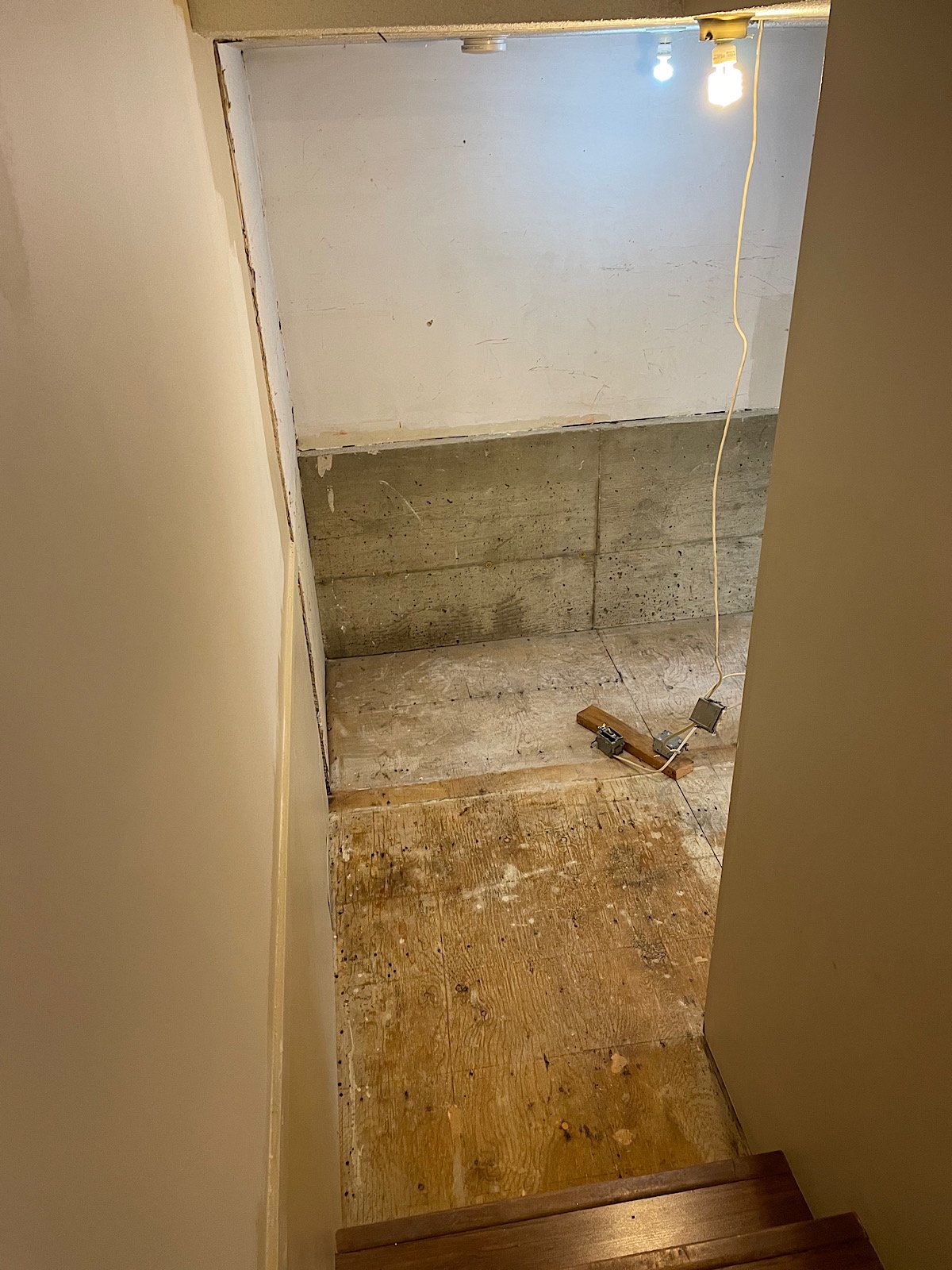 During - Wall removed to expand mud room into unused garage space