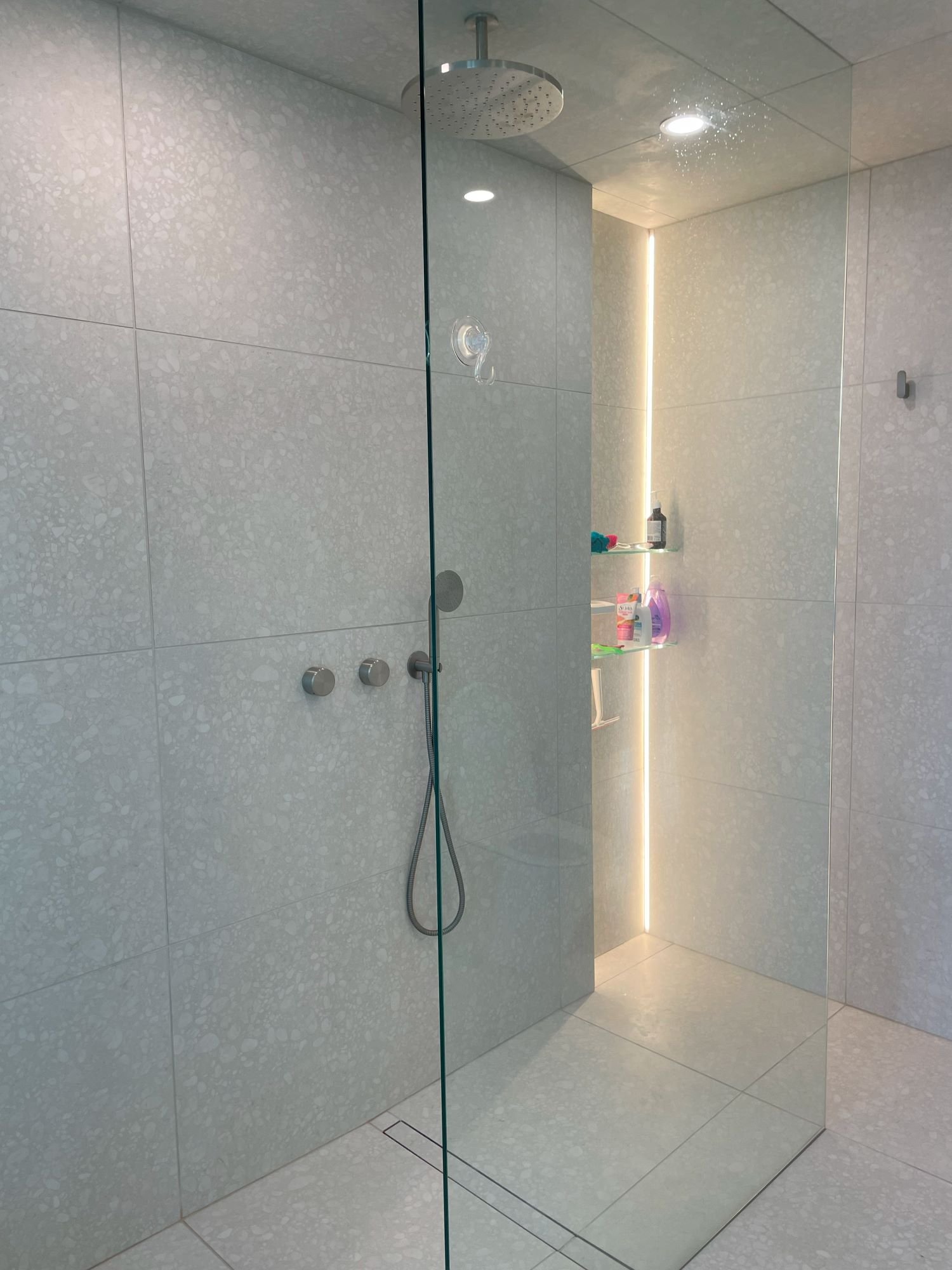 Ensuite Shower - After. Curbless walk-through with linear tiled drain