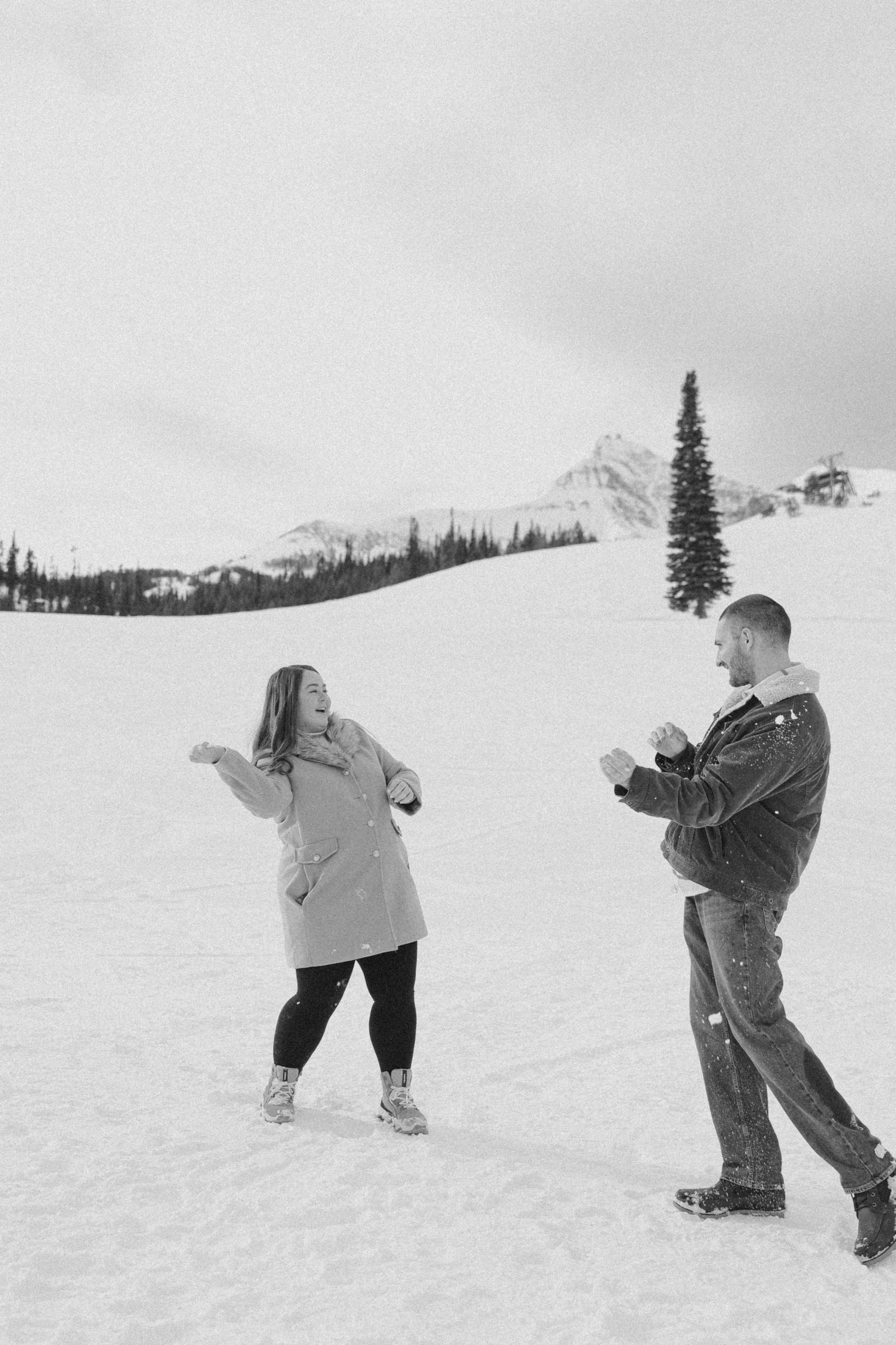 The Snowball Ambush Engagement Photo Session – Big Sky Montana