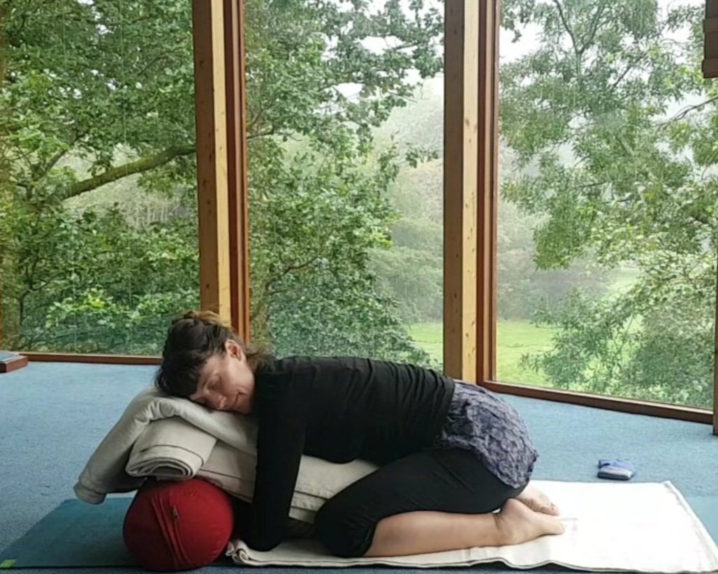 Vanessa Bear doing restorative yoga