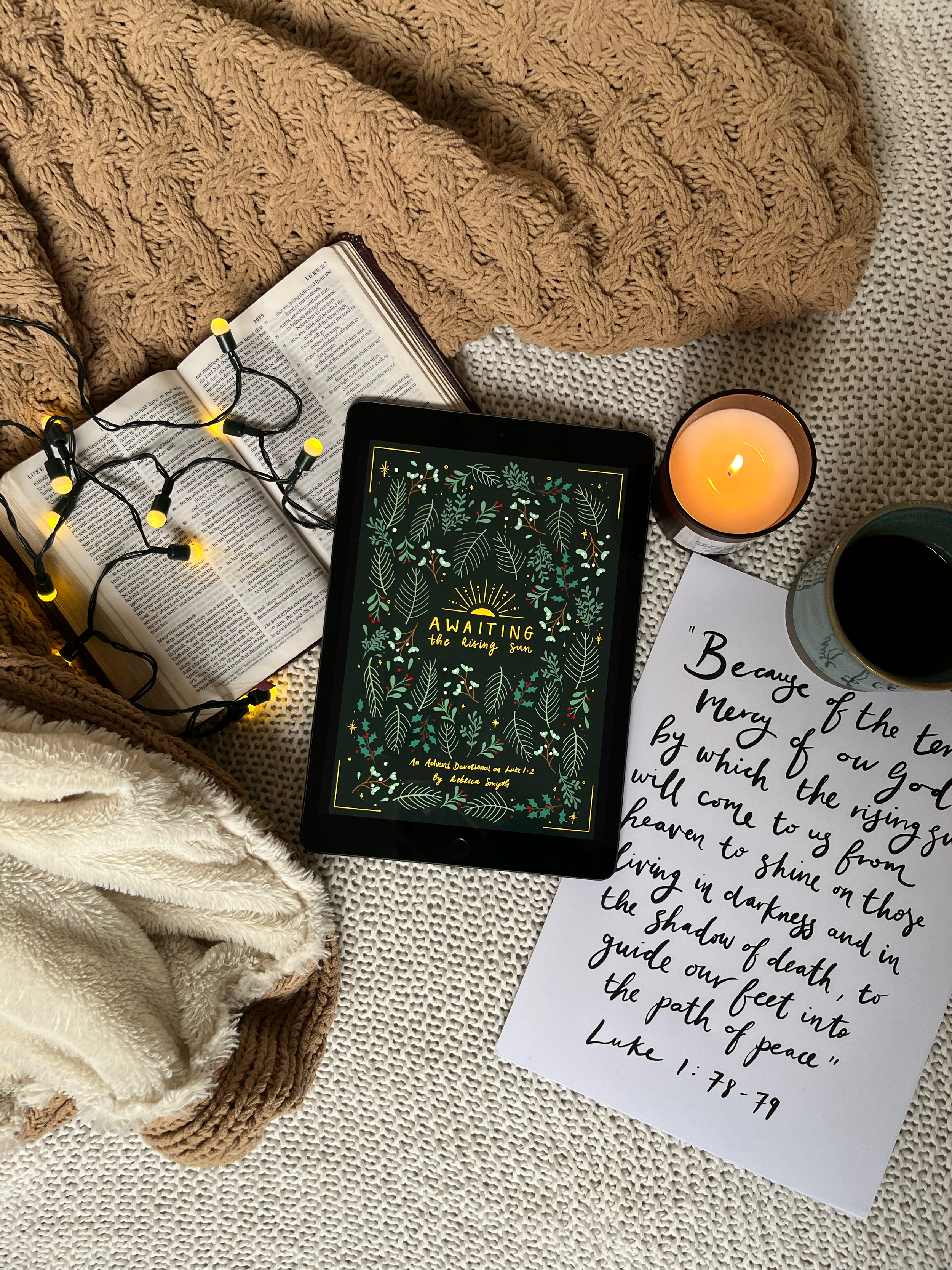 Picture of iPad showing ebook with bible, fairy lights and a bible verse from Luke chapter 1