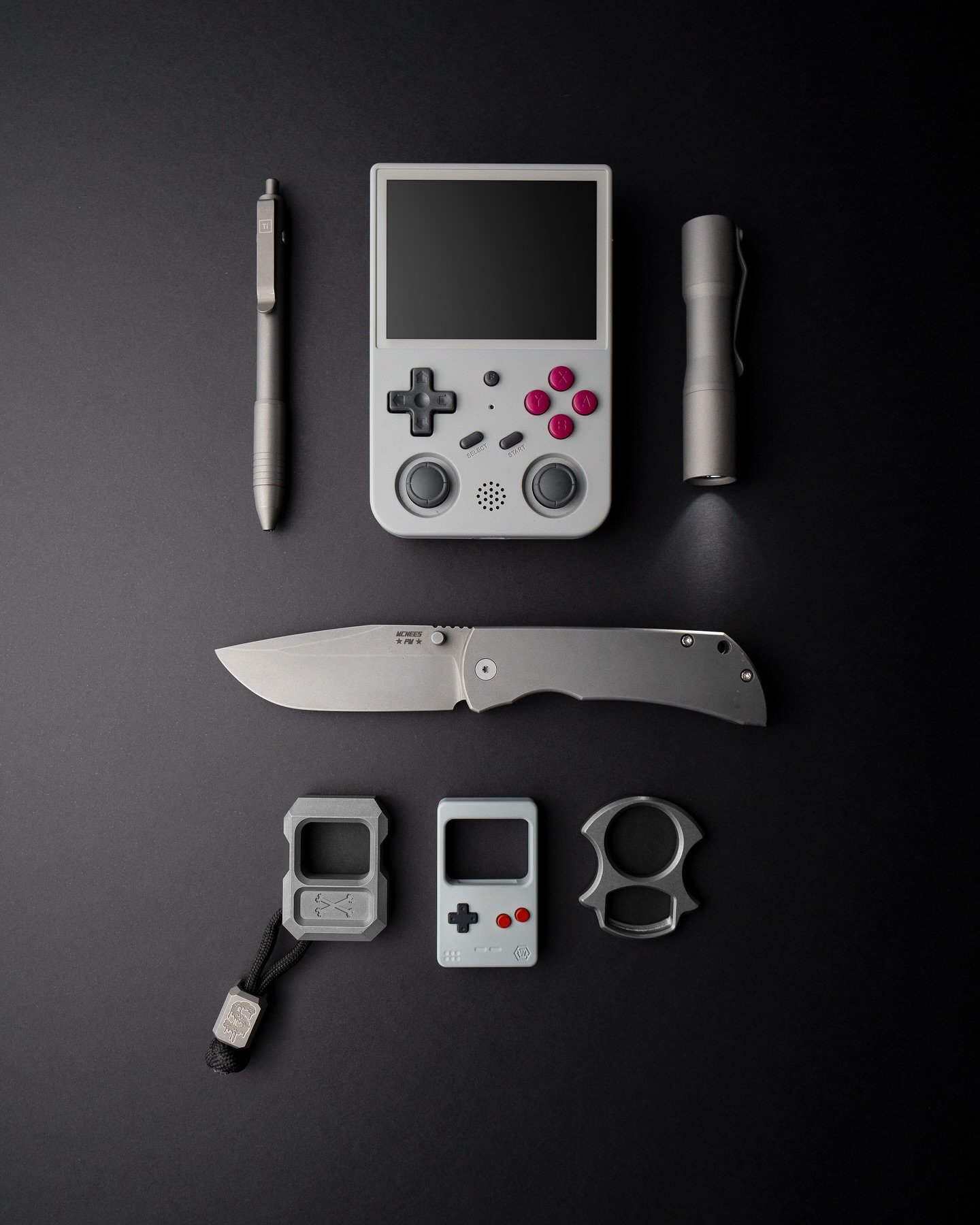 Happy Ti Tuesday.
.
A crisp, monochrome spread with some goodness by @mcneesknives, surrounded by some goodies that pay homage to the 90s. 
.
Shapes and buttons that feel like echoes from a different era.
.
Modern craftsmanship with a vintage heartbe