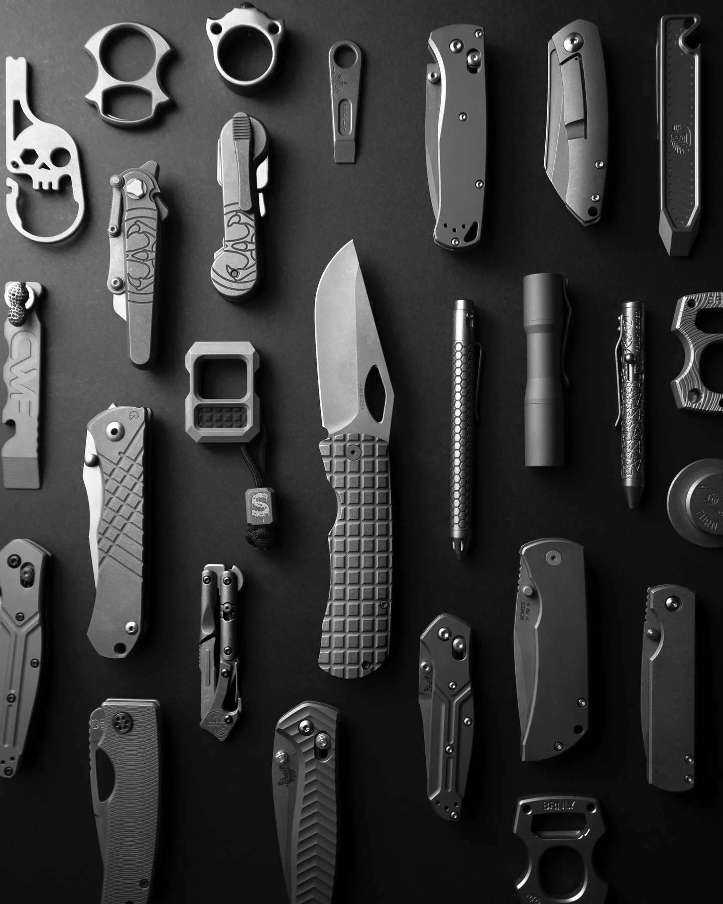 I started with the Dixon for this flatlay, then somehow I kept building it out piece by piece until it turned into this little wall of titanium attitude. 
I should do another one, since I am definitely missing a few pieces that could have made it. 
.