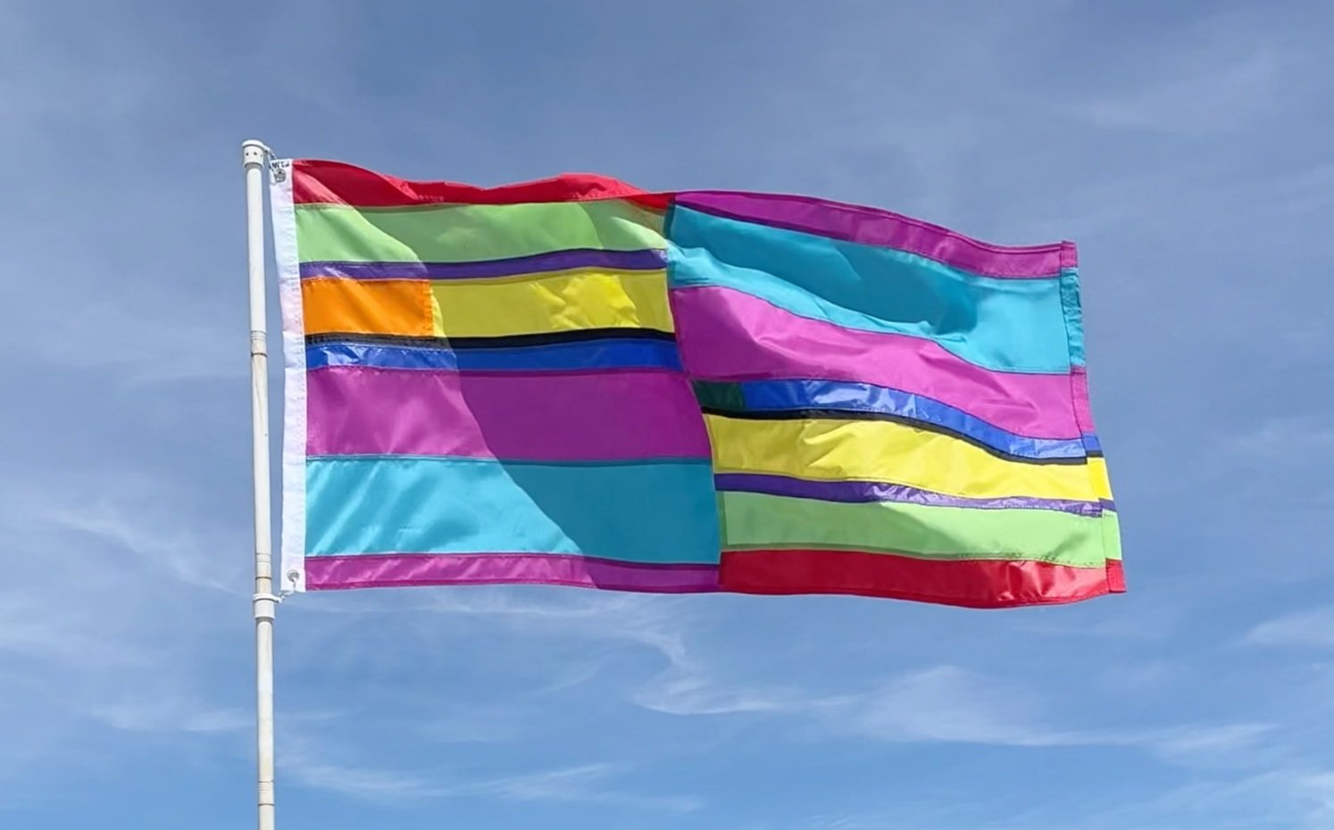 Utopian Pride Flag #22, 2024, Re-ordered nylon pride flags, 50" x 74"