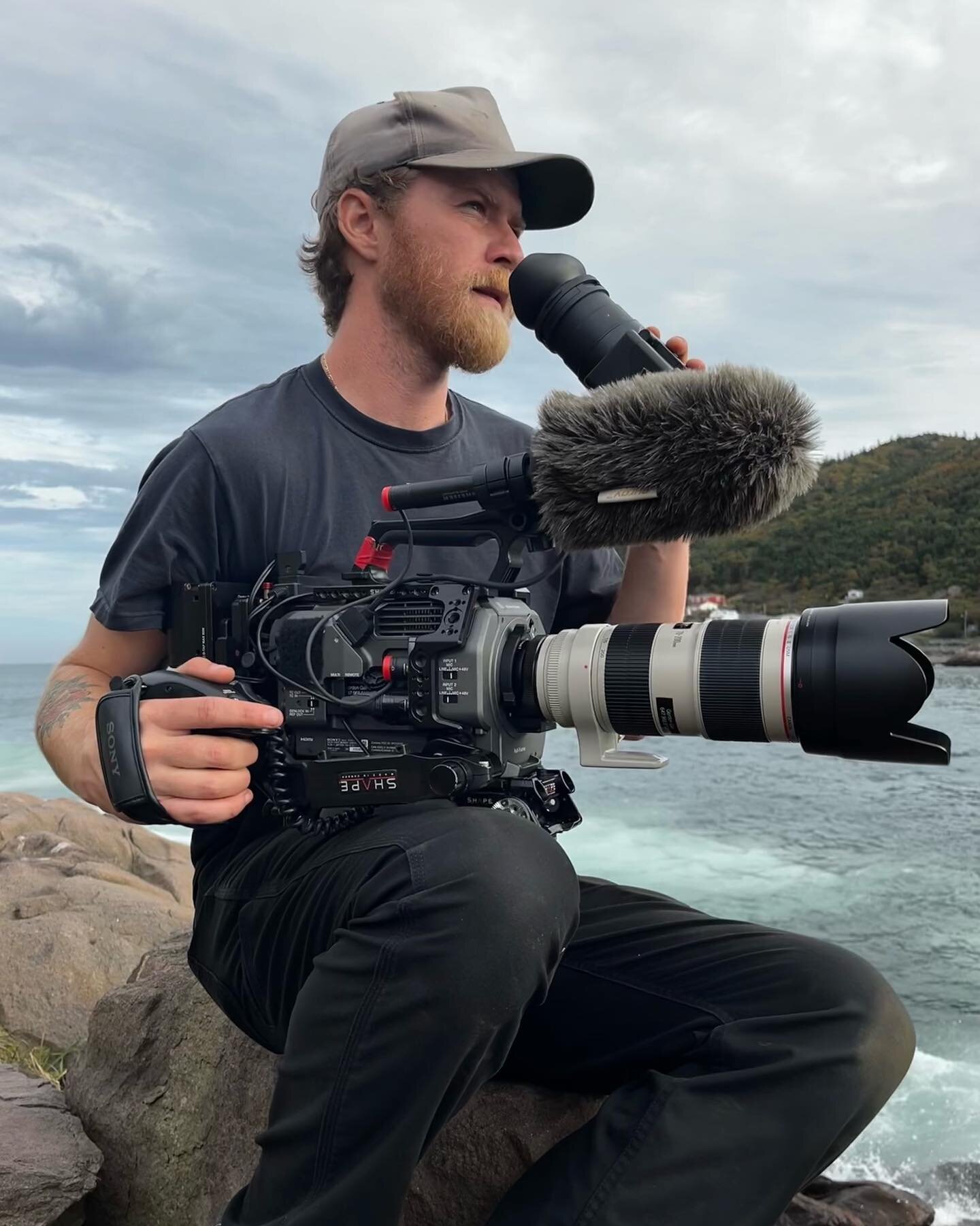 Gord lately, like Gord formerly: By the ocean with his camera and his hat