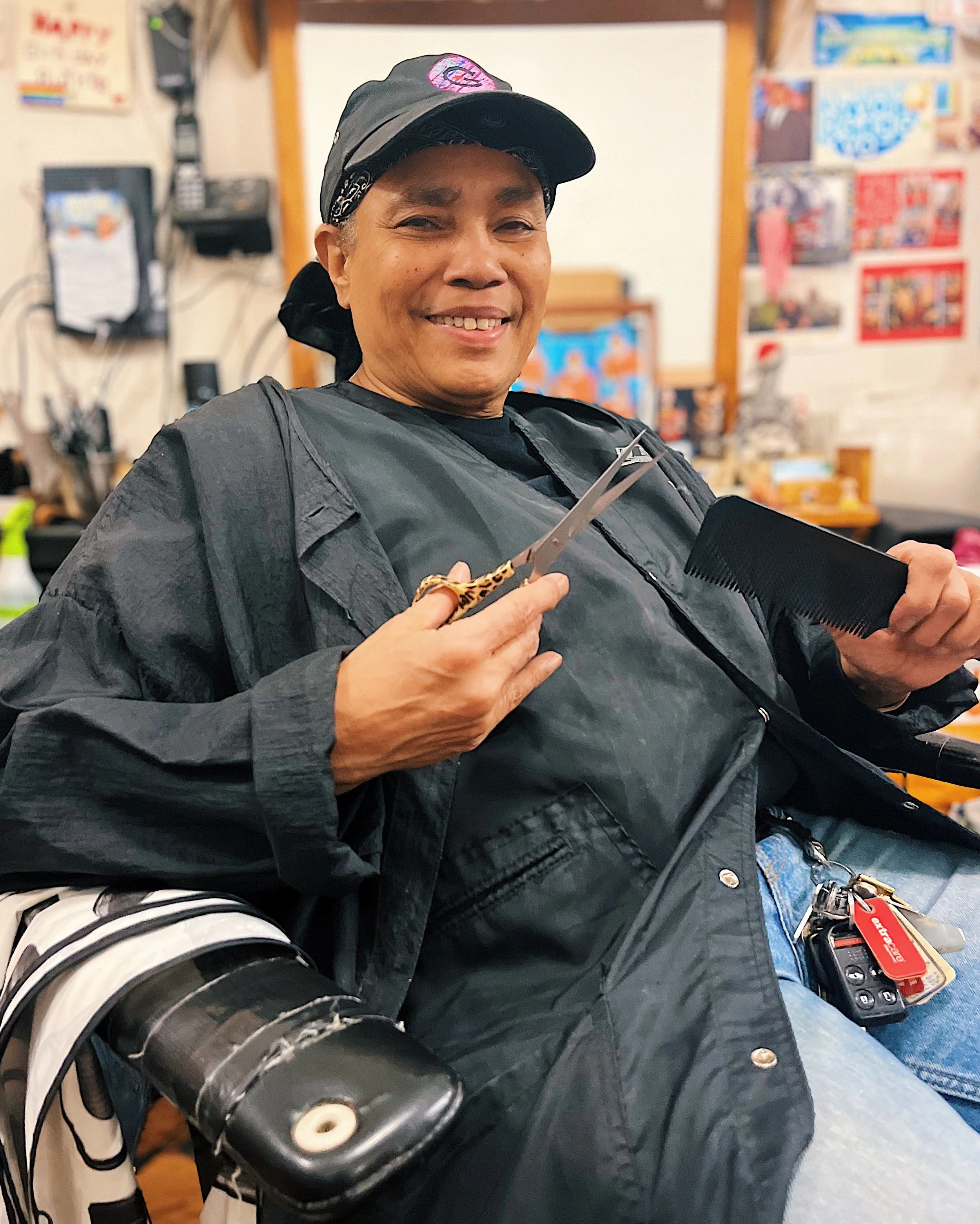 Brooklyn Barber Ruth Boirie shows off her styling implements. Ruthie has owned and operated Ruthie's Neighborhood Barber in Park Slope for 27 years. She is also an adept carpenter. She applies the mind of an engineer with the touch of an artist to ea
