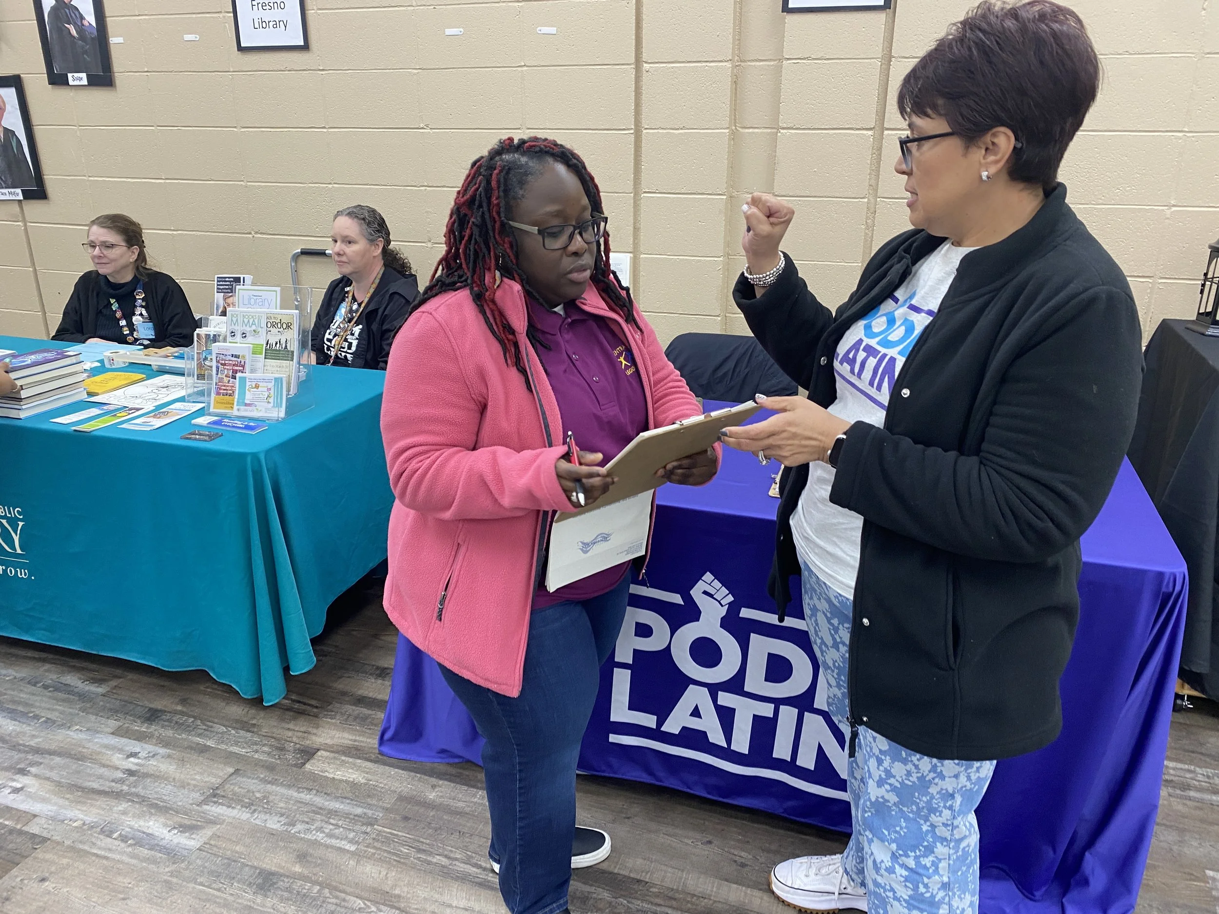 Registering to Vote Latasha at the DHHSC with my basic sing language  .JPG