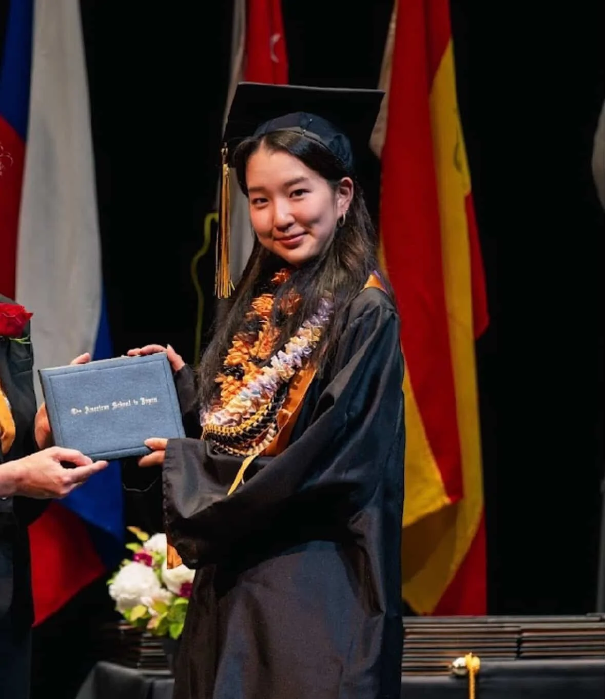 A girl graduating from American School in Japan
