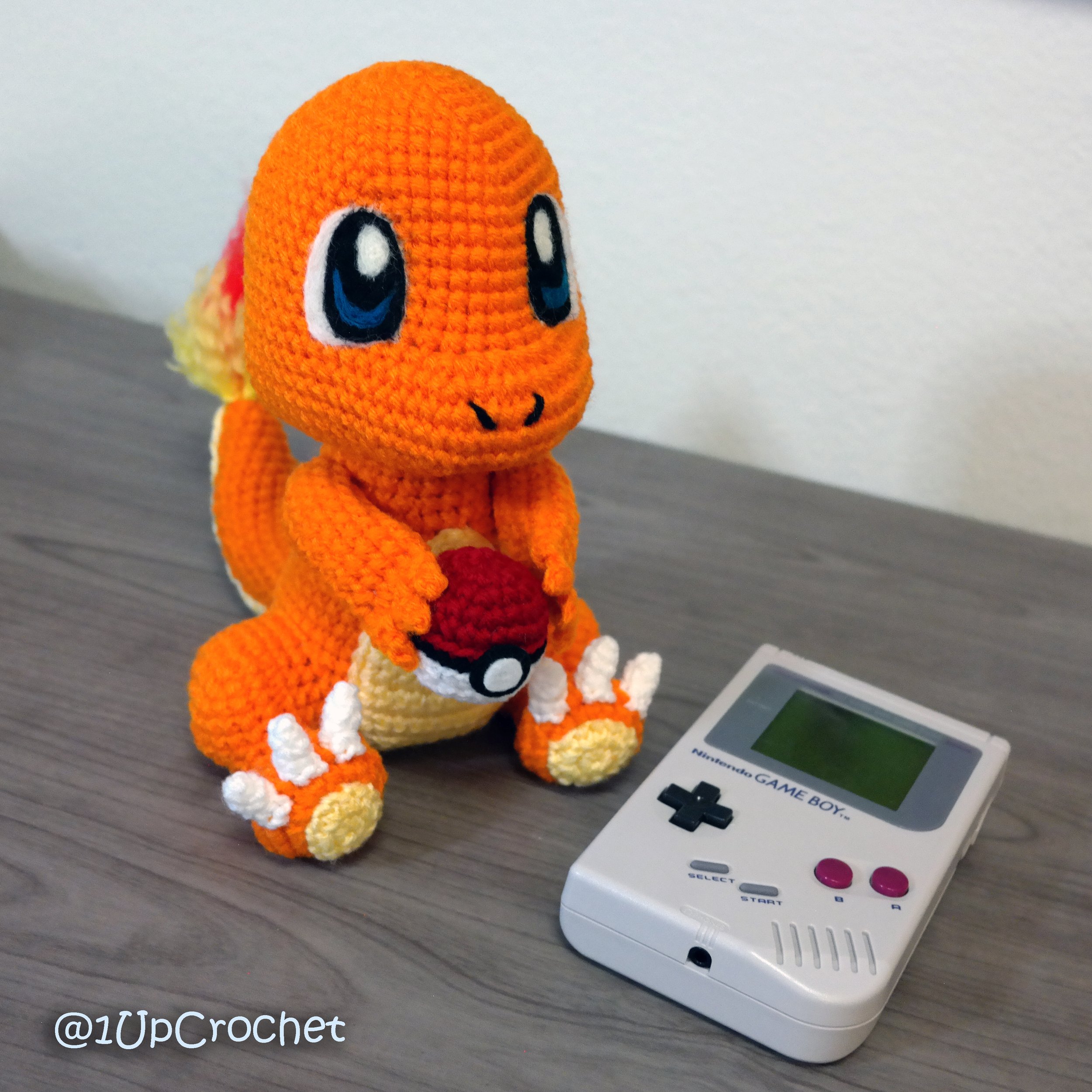Here comes the boyyy. Here we have the classic starter boi Charmander  crochet using a specific glow in the dark yarn as well as a sweep of glow  in the dark powder. 