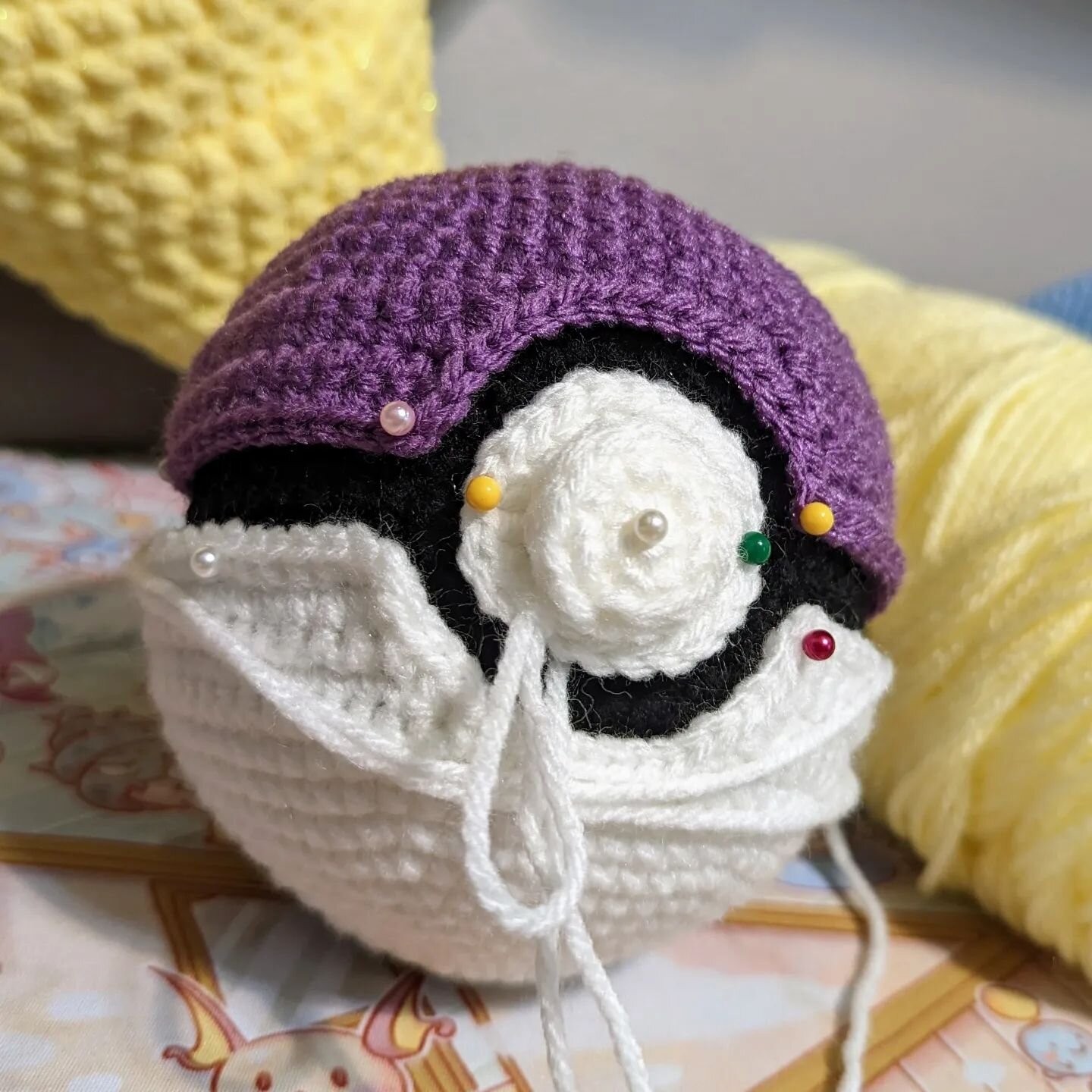 This is the PERFECT Pokeball pattern! This is going to be made into a Master Ball and I absolutely love how this is shaped! My long term goal is to make ALL (or almost all) THE BALLS. 

Pattern by the extremely talented @aradiyatoys 
Please go check 