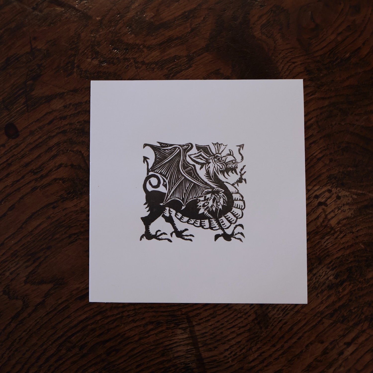 Ddraig fach  (black) - Little Dragon - Wood engraving Richard Studer