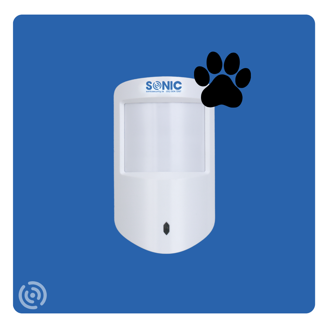 Sonic wireless pet-friendly PIR motion detector with digital weight-filtering lenses installed in the corner of a living room by Sonic Security Systems Dublin.