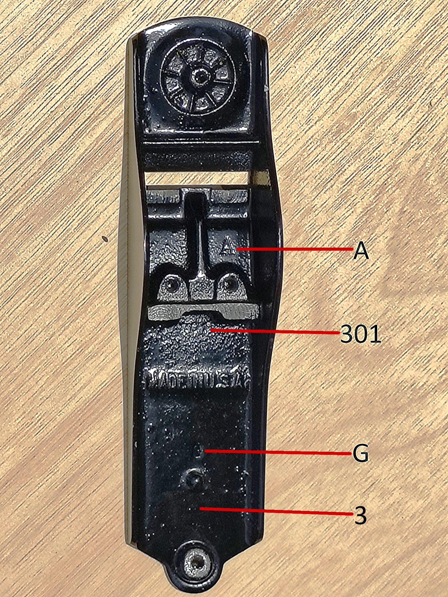 Unlike the original type 2, the second release will have one or more letter stamp on the bed. The casting number will be stamped under the frog adjustment screw on this type.