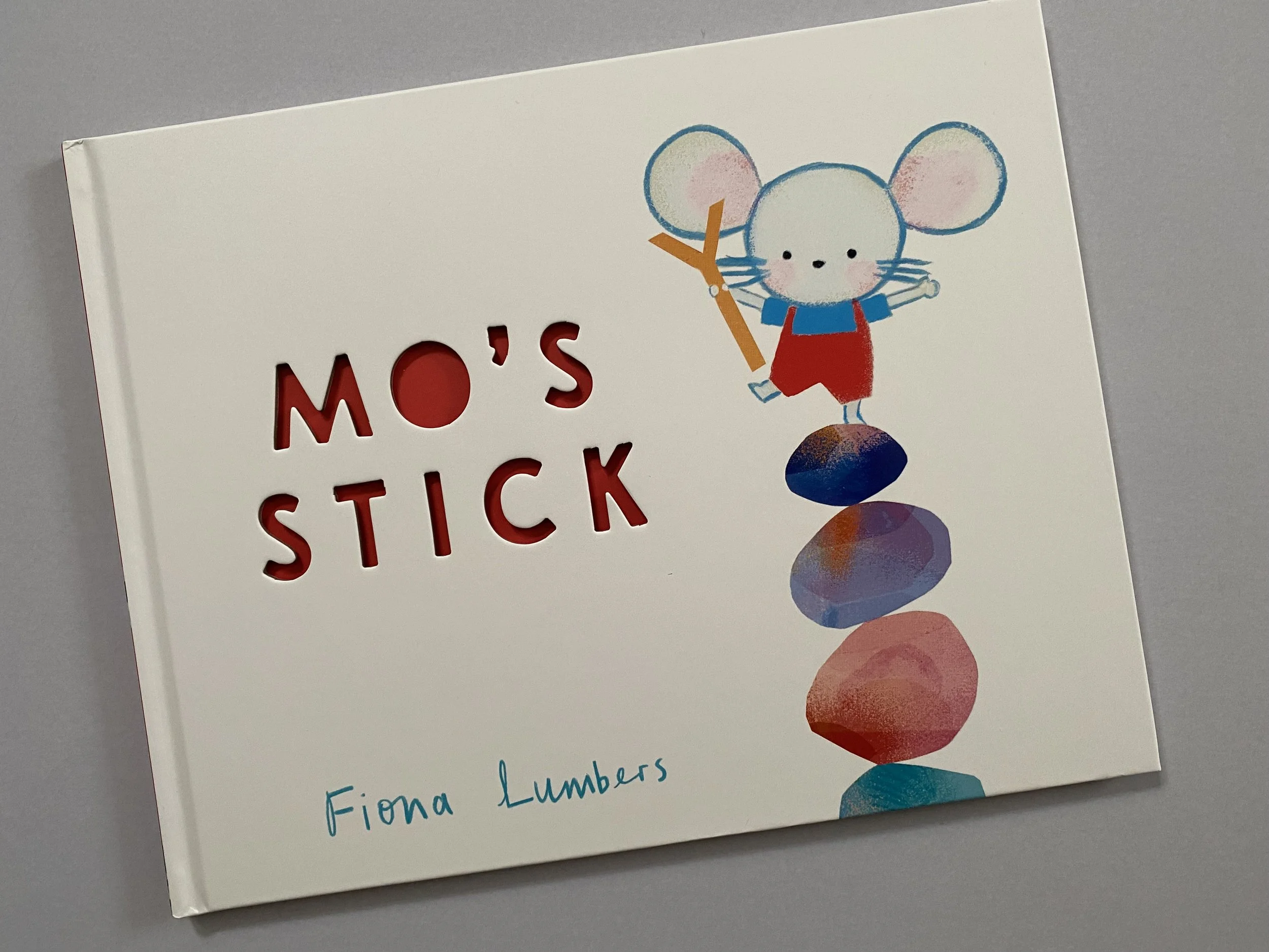 Mo’s Stick — Through the Bookshelf