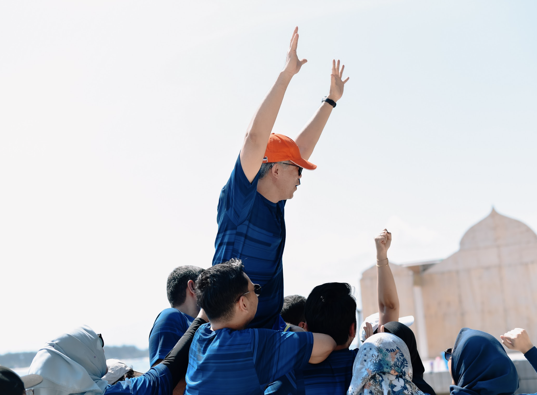 Corporate team enjoying company outing retreat at beachside resort in Bali