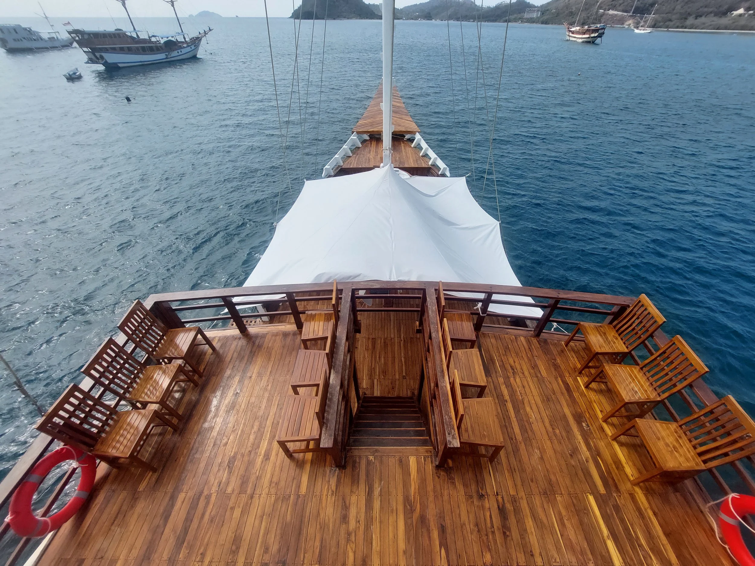 Premium phinisi sailing boat exterior during Lombok to Komodo liveaboard journey across Flores Sea