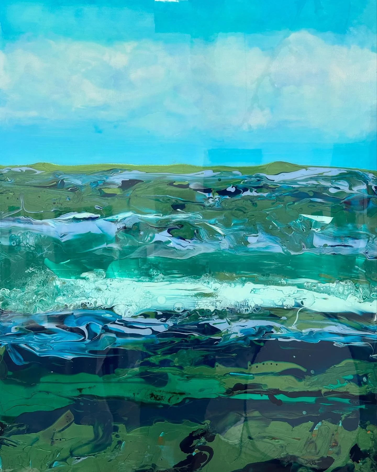 Bella Countryside, 48”x36”, Available. This poured painting on a birch cradled panel is inspired by the hills of Campania, Italy is one of my most admired artworks. In blues and greens with glorious reflections it would make a perfect sta