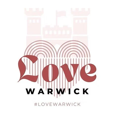 Graphic design with a castle outline in the background, a heart with vertical stripes, the word 'Love' in large stylized font, and 'WARWICK' in bold uppercase below, with a hashtag '#LOVEsWARWICK' at the bottom.