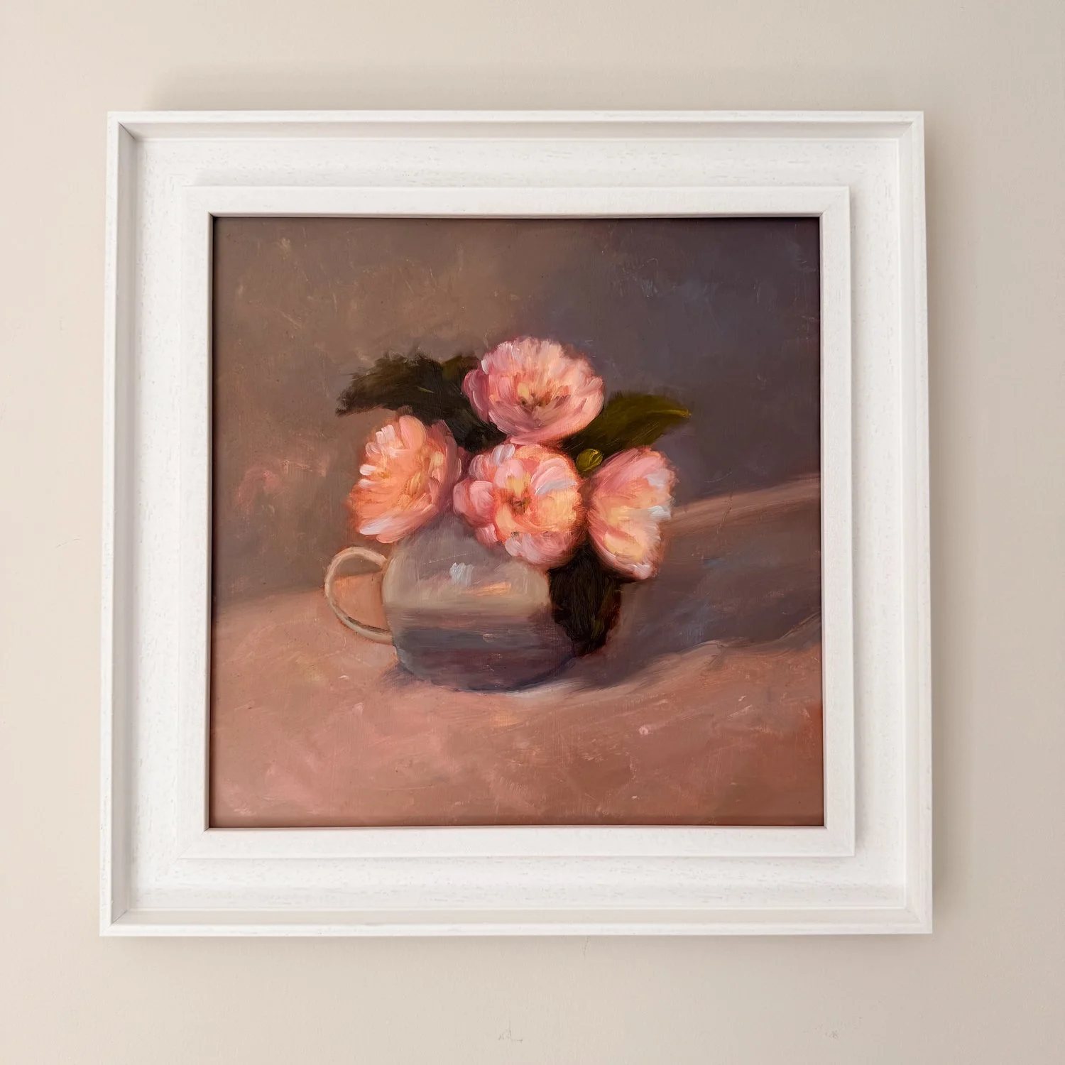 A little Mug of Camelias
30 x 30cm

The pink camellias in the back garden suddenly appeared so I just had to paint some. After a quick browse around the kitchen I found this little grey mug to put them in. The painting is more pink than brown in real