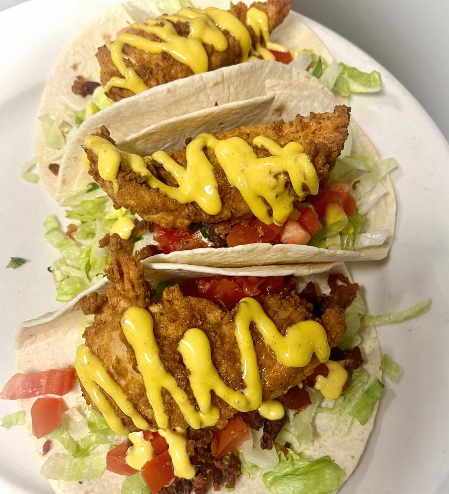 .
Fried Chicken BLT Tacos 😊😊
&mdash;3 flour tortillas filled with Fried Chicken Strips, lettuce, tomato, and Bacon. Drizzled with Honey Mustard and served with your choice of a side! 

⭐️ This will be our Taco Special all weekend. Open 11:30-10:00 