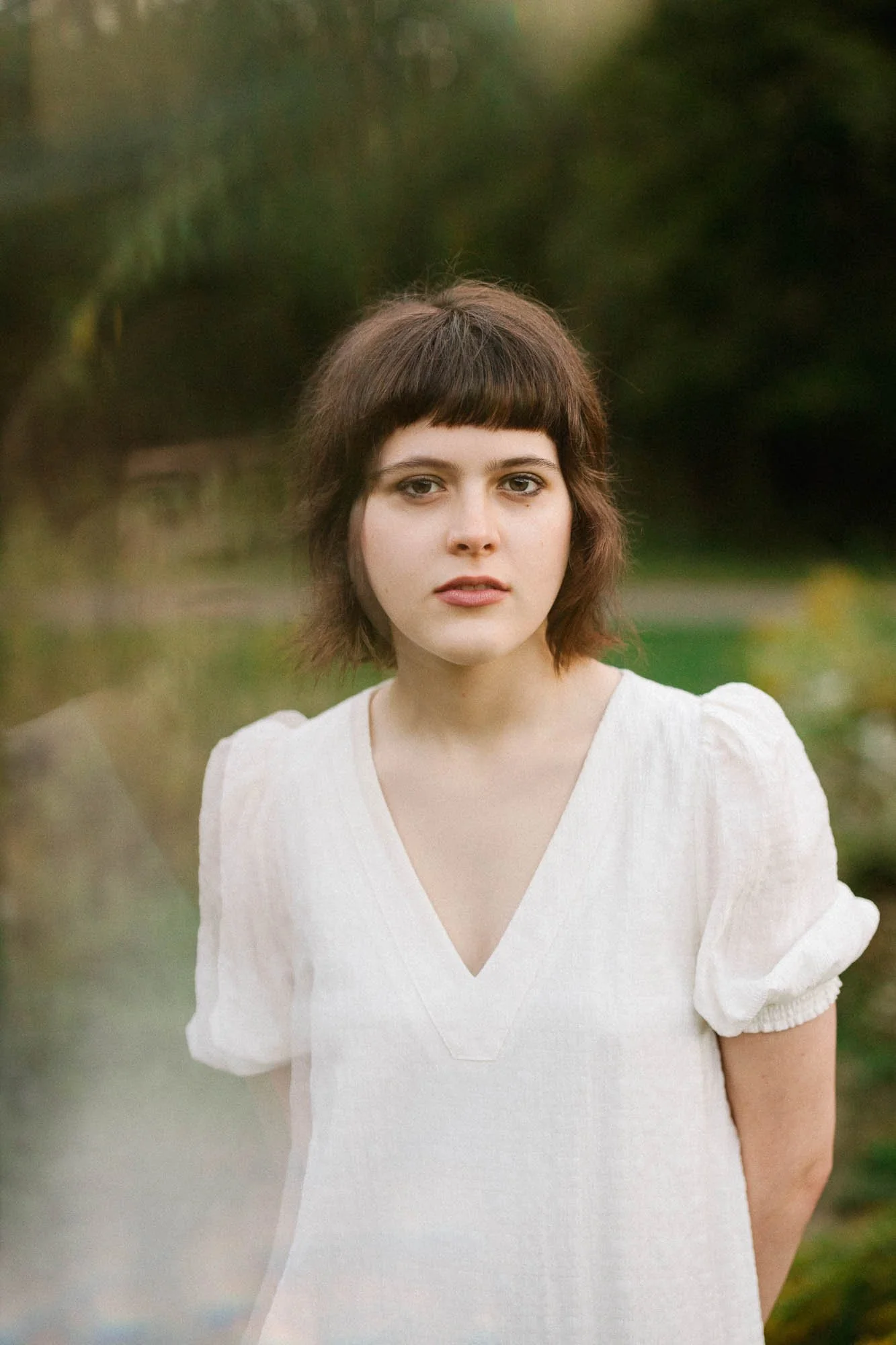 Columbus senior looking confident and authentic in personal style during senior portrait session outdoors