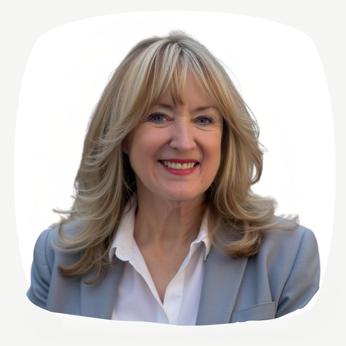 Diana Ramsay headshot. She has blonde hair, a white shirt and a grey suit jacket.