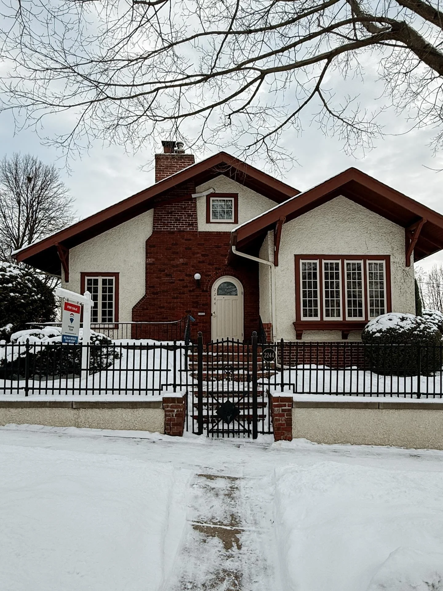 Lovely Merriam Park 1915 Craftsman. I loved the uniqueness of the front exterior of this home. The tapered fireplace, original windows, coffered ceiling, and sun room all make this home warm and inviting. 

Interested in finding your own home to love