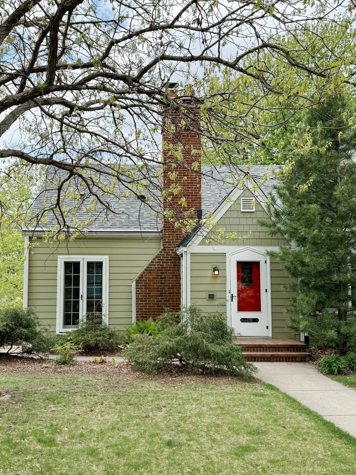My buyers landed this adorable story and a half in the Shenandoah Terrace neighborhood of Northrop. The back has an addition with an enter wall of windows. The kitchen was tastefully renovated to fit the 1920s. Sometimes homes just feel right the mom