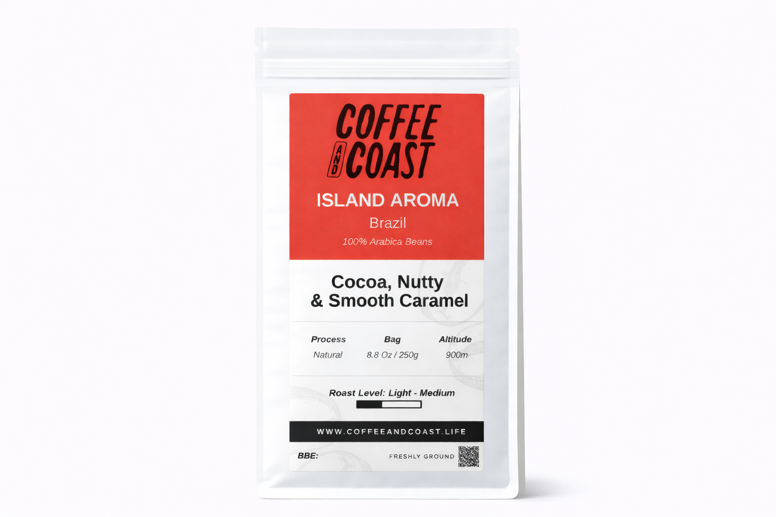 Packaging of coffee beans labeled 'Coffee and Coast Island Aroma Brazil 100% Arabica Beans, Cocoa, Nutty & Smooth Caramel, Process Natural, Bag 8.8 oz/250g, Altitude 900m, Roast Level Light - Medium, Website www.coffeeandcoast.life, Freshly Ground.'